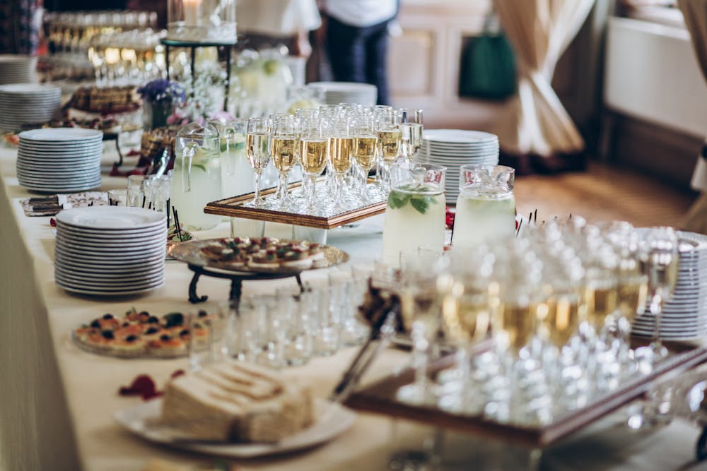 a dining table with a cake