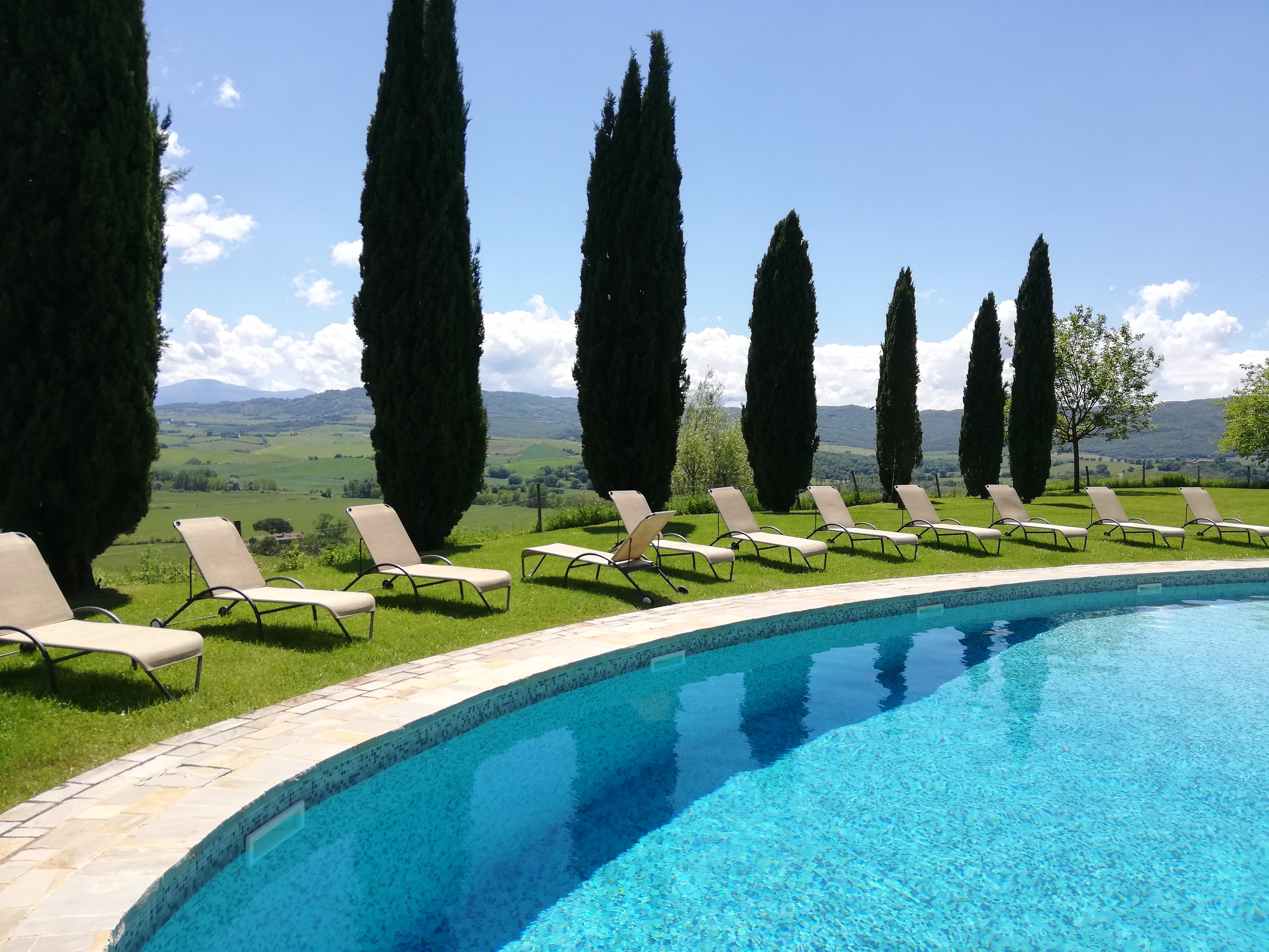 a pool next to a body of water