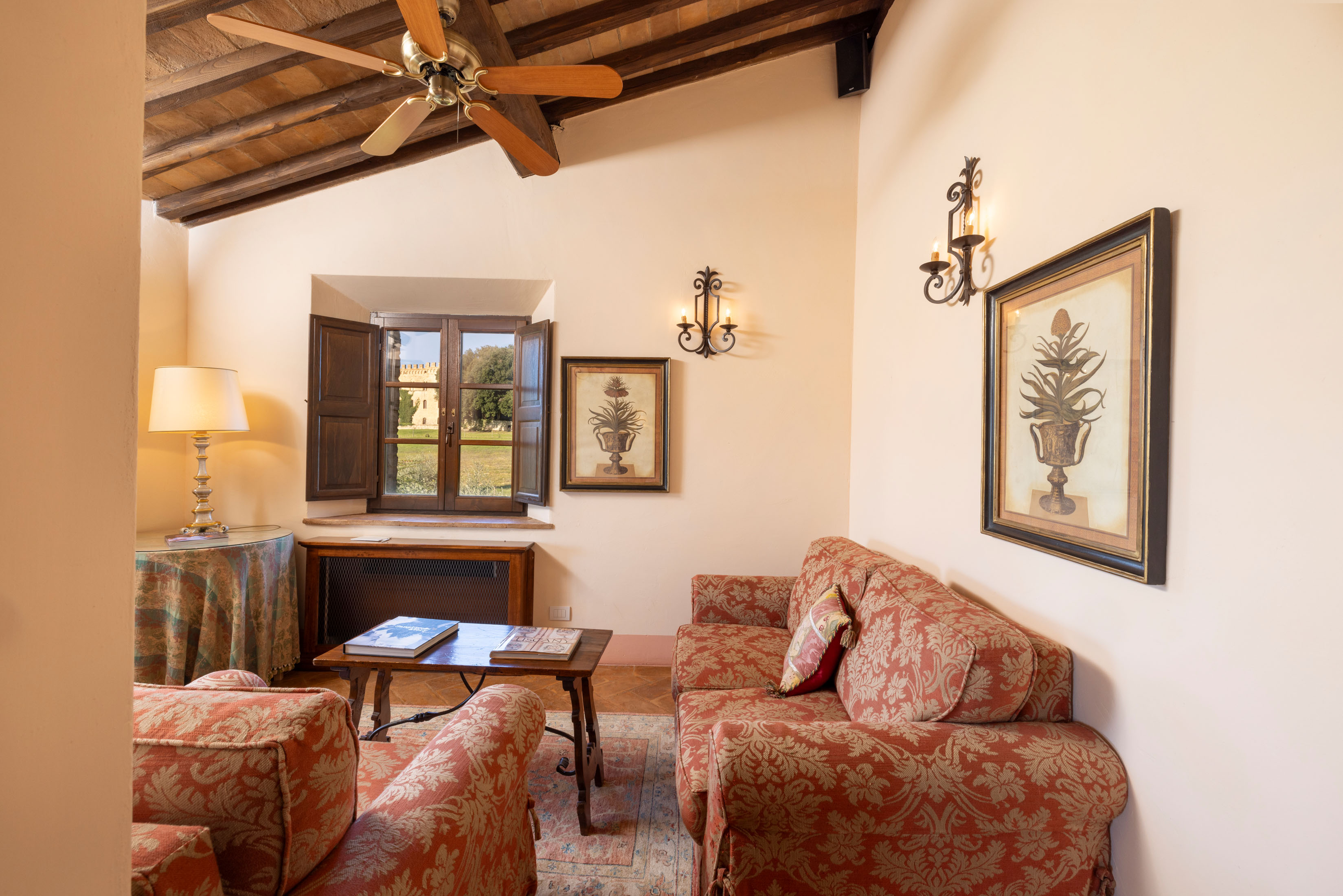 a living room filled with furniture and a fireplace