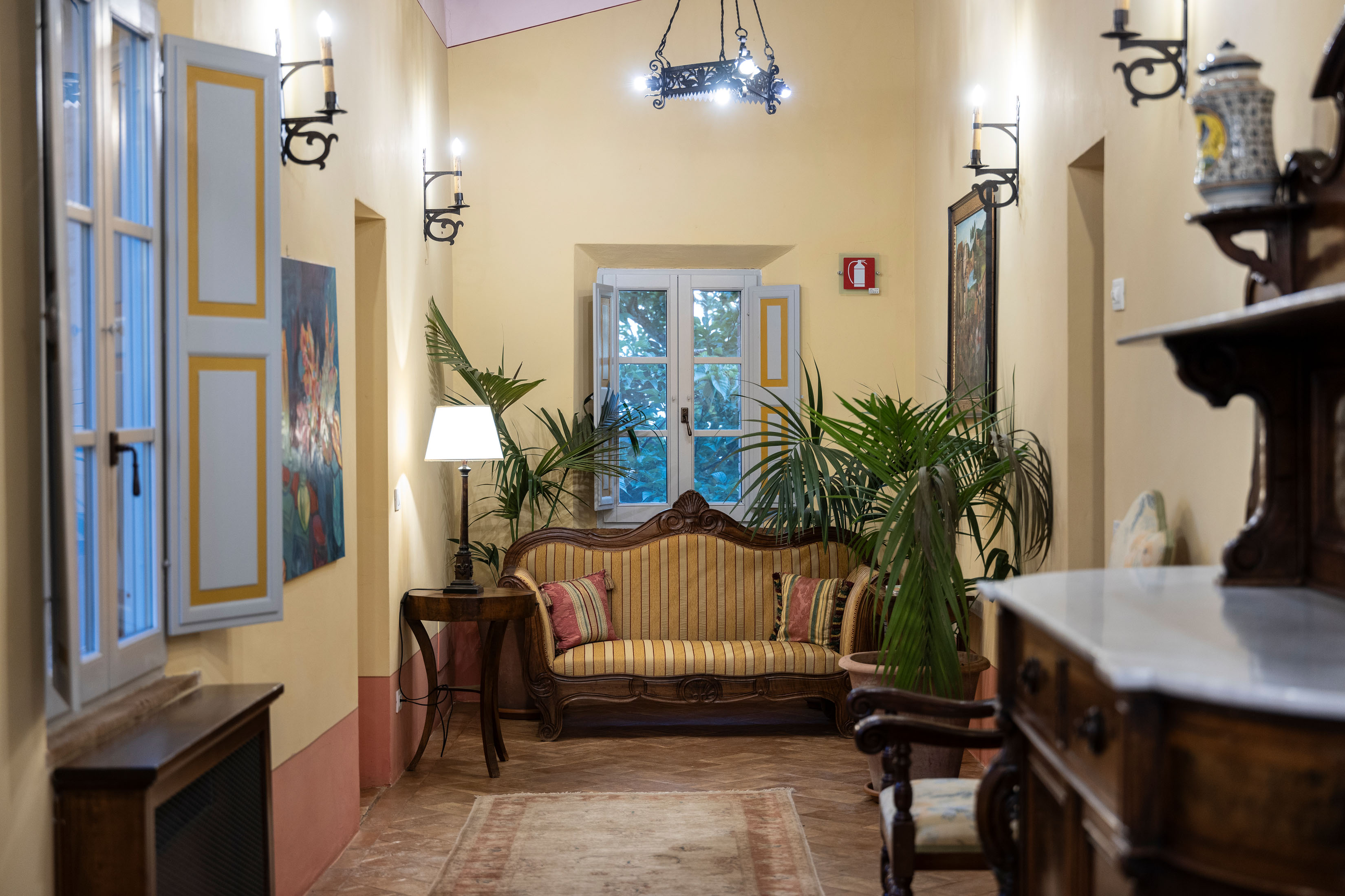 a living room filled with furniture and a fireplace