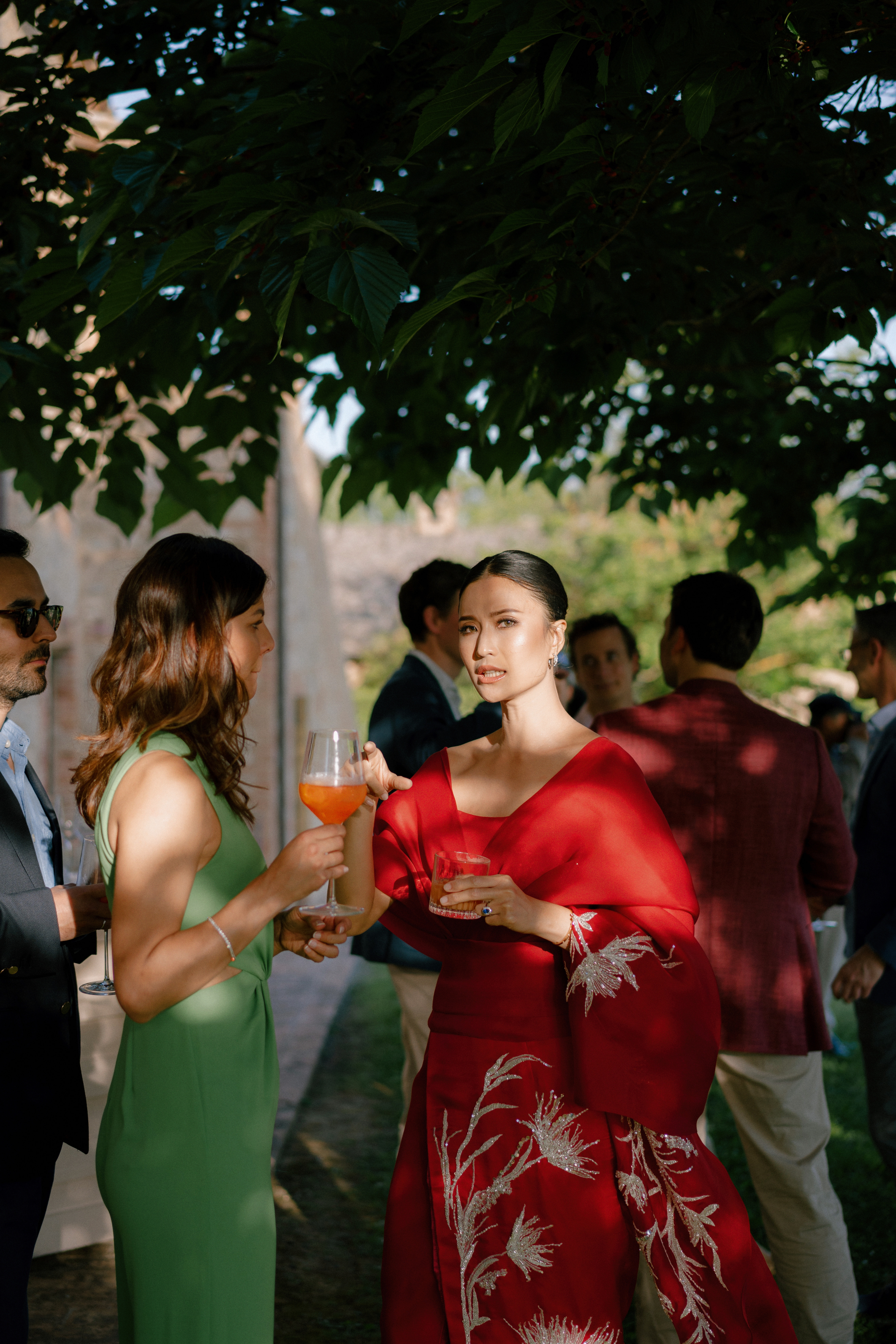 a group of people standing next to a person