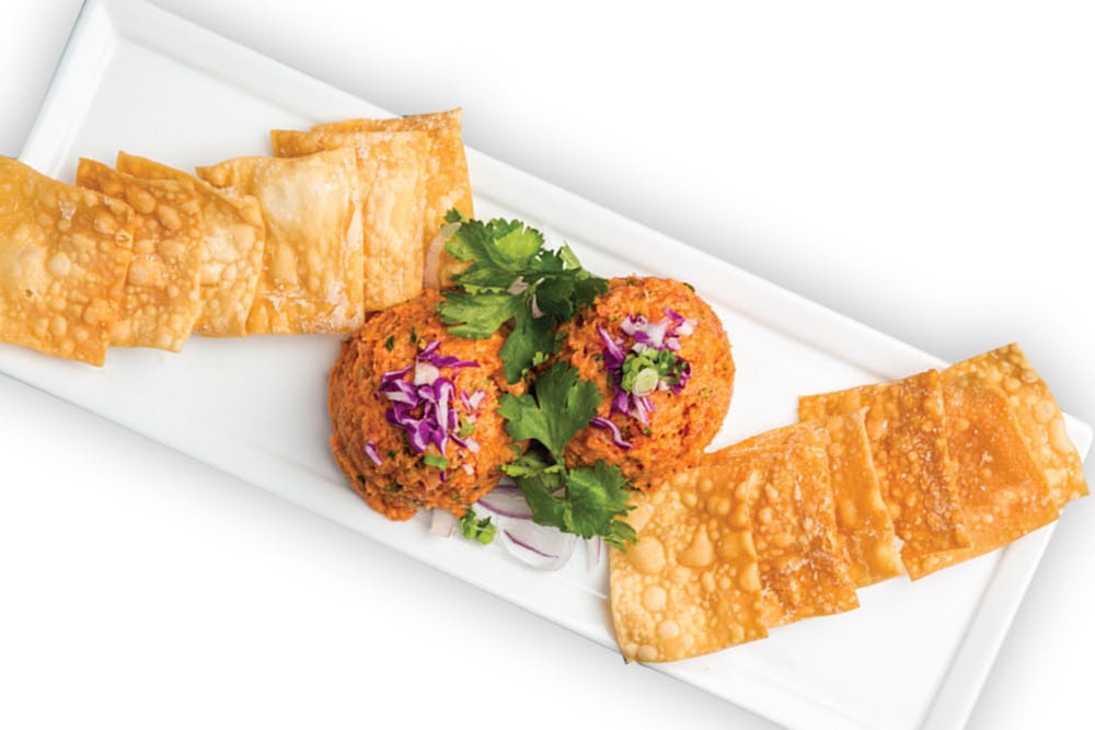 a sandwich cut in half on a plate