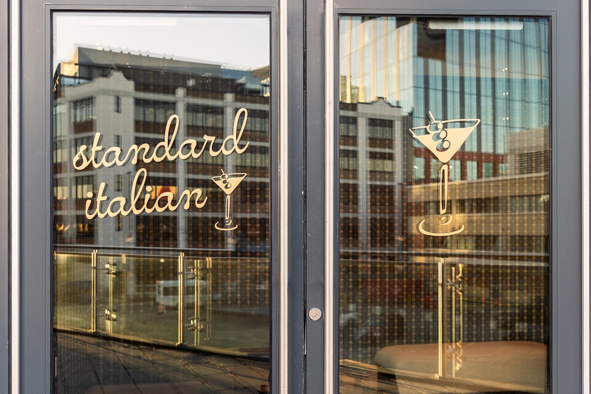 a glass door of a store window