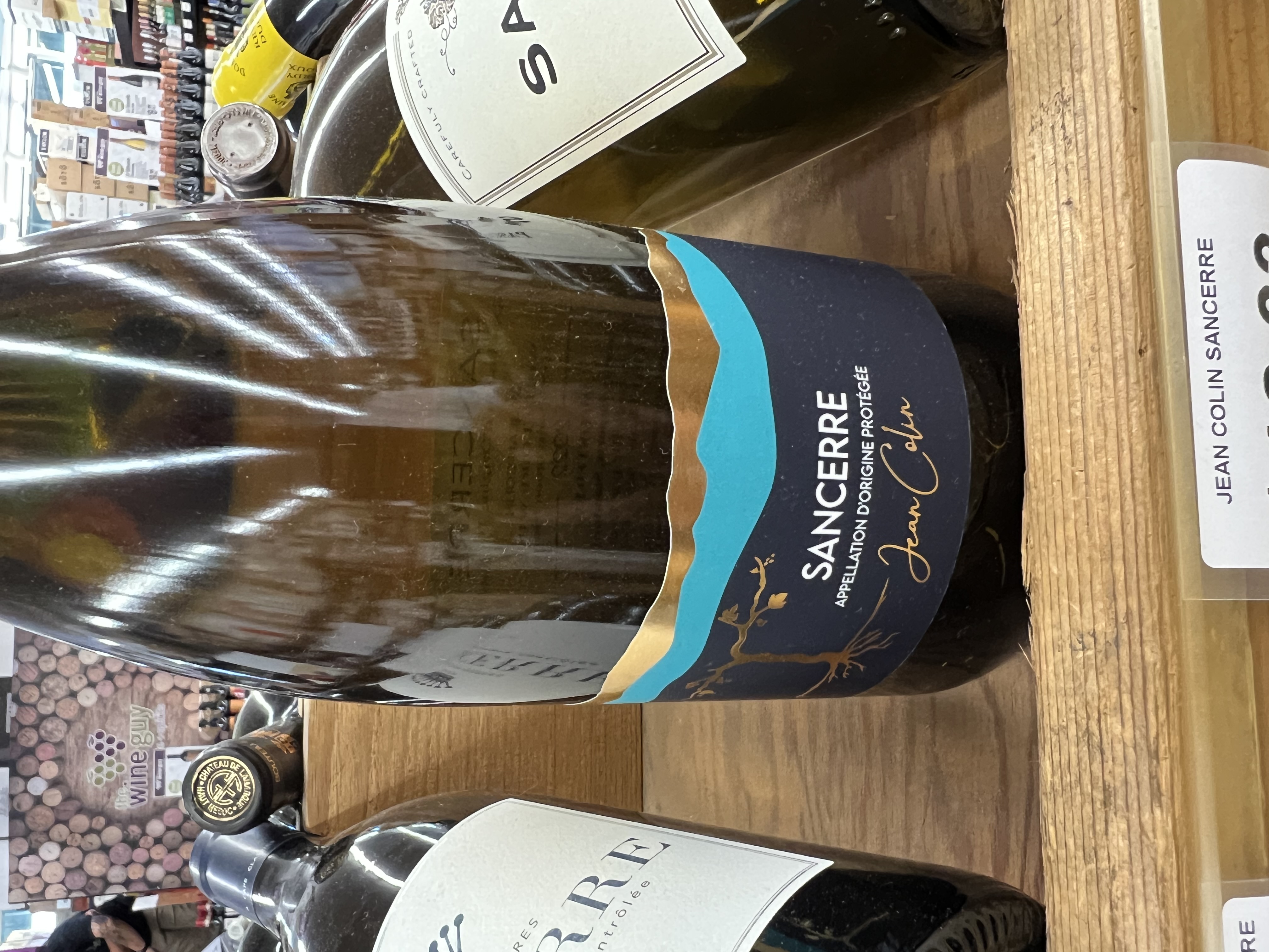 an empty bottle sitting on a table