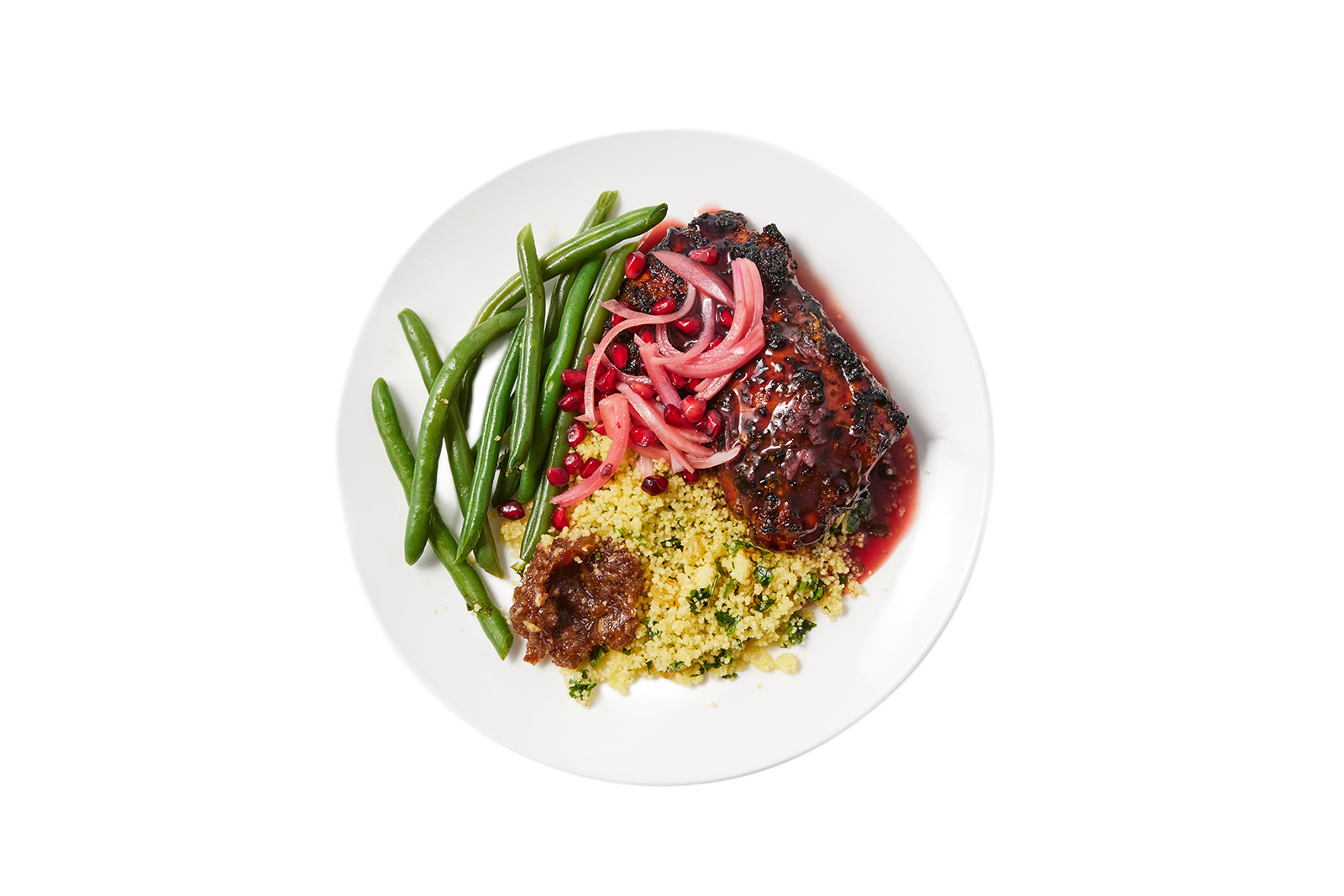 a plate of food on a black background