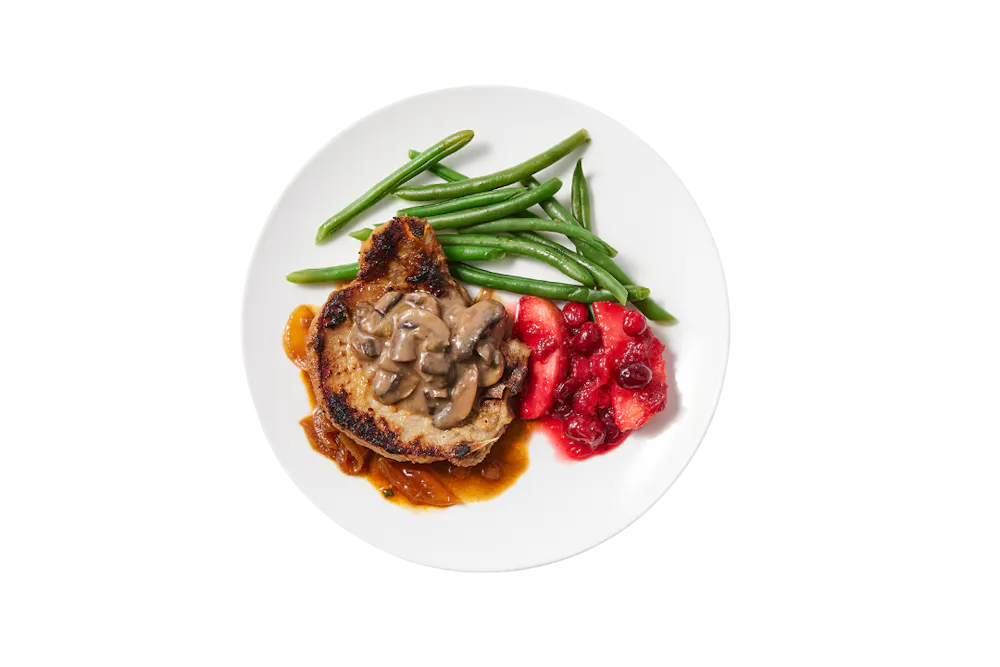 a plate of food with a black background
