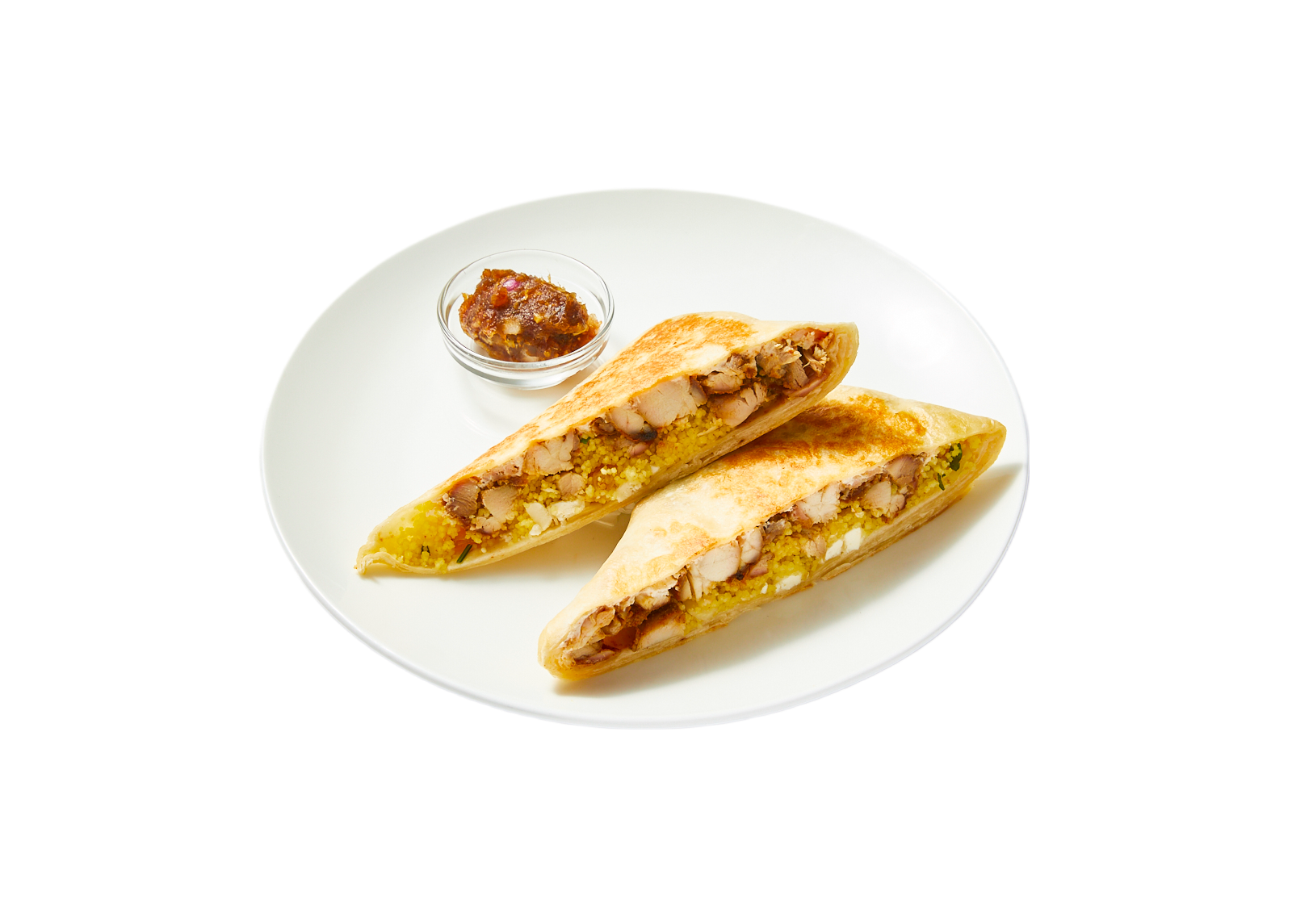 a plate of food on a black background