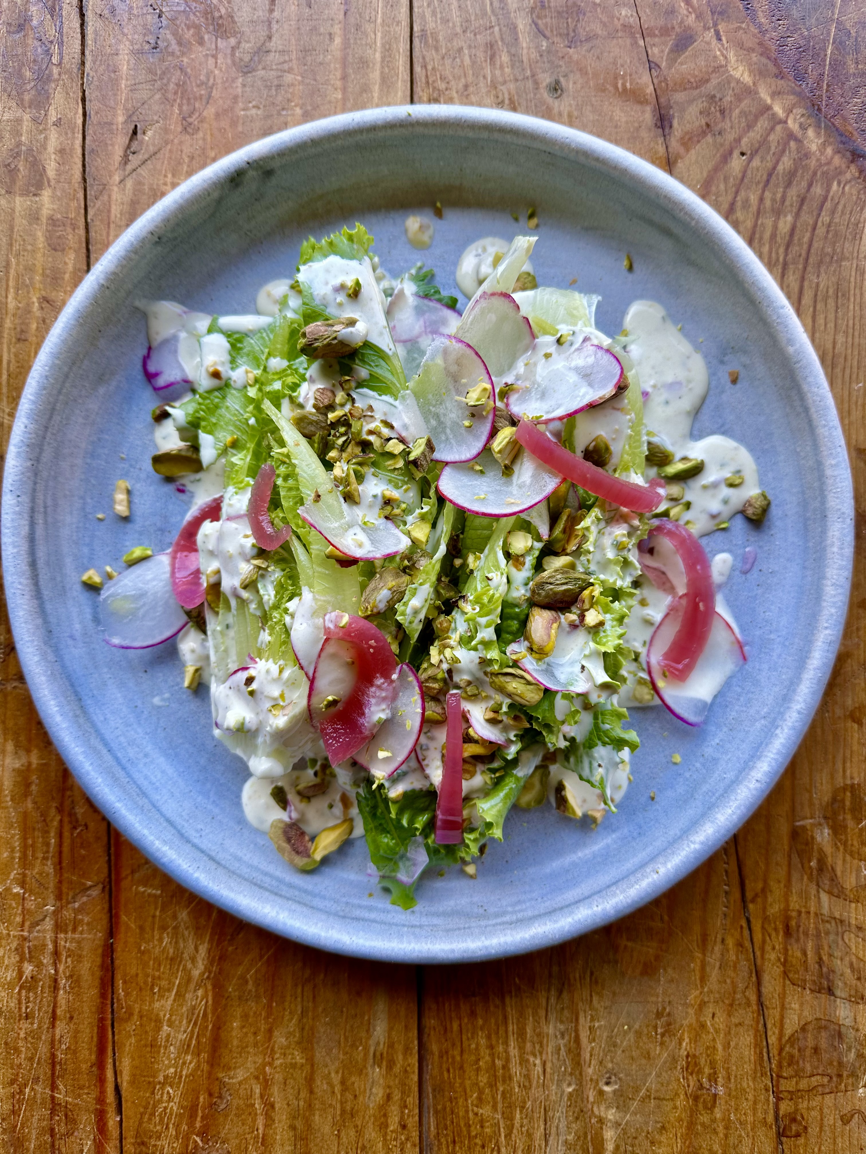 a bowl of salad on a plate