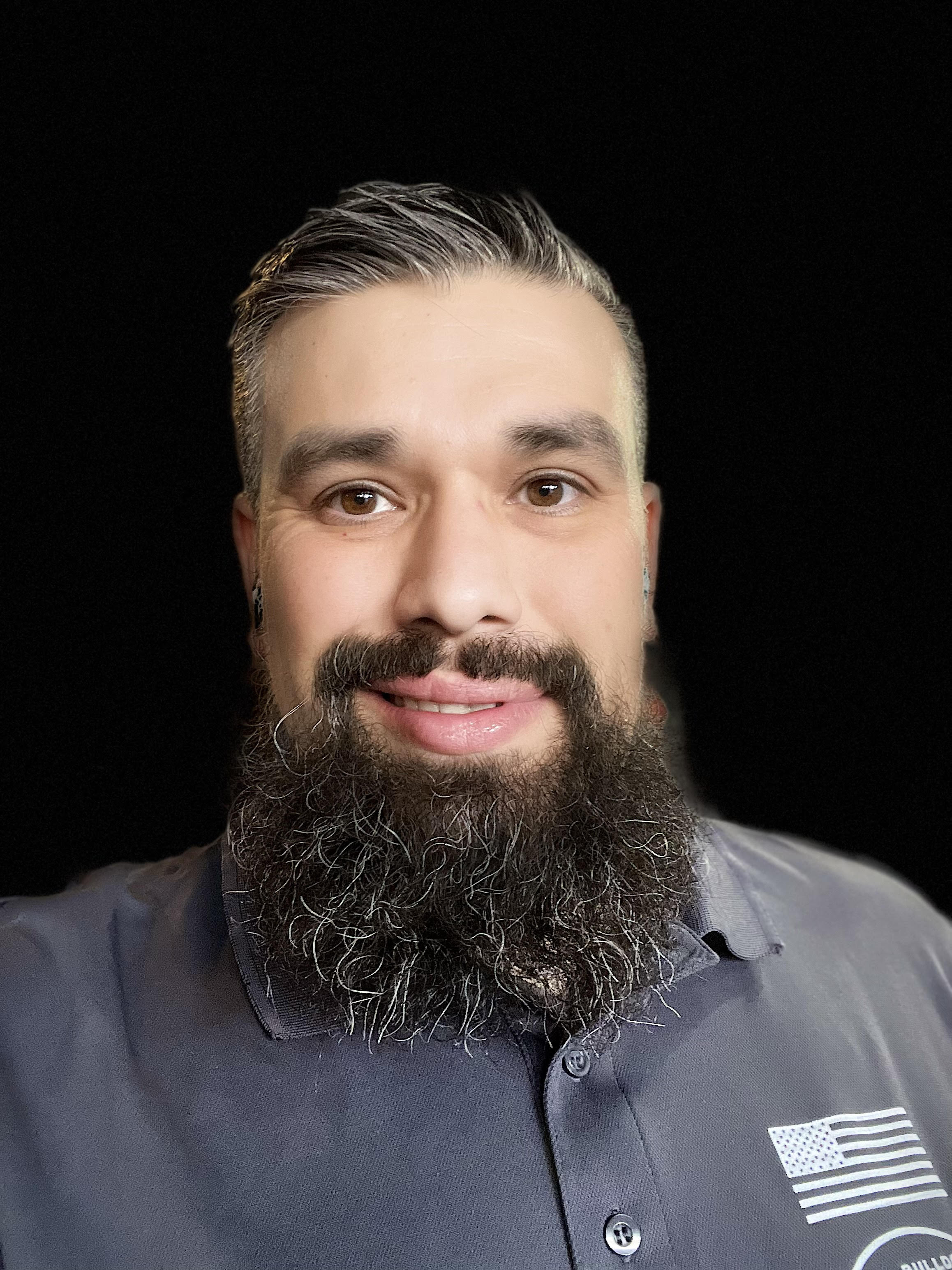 a man smiling for the camera