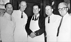 a group of people posing for a photo