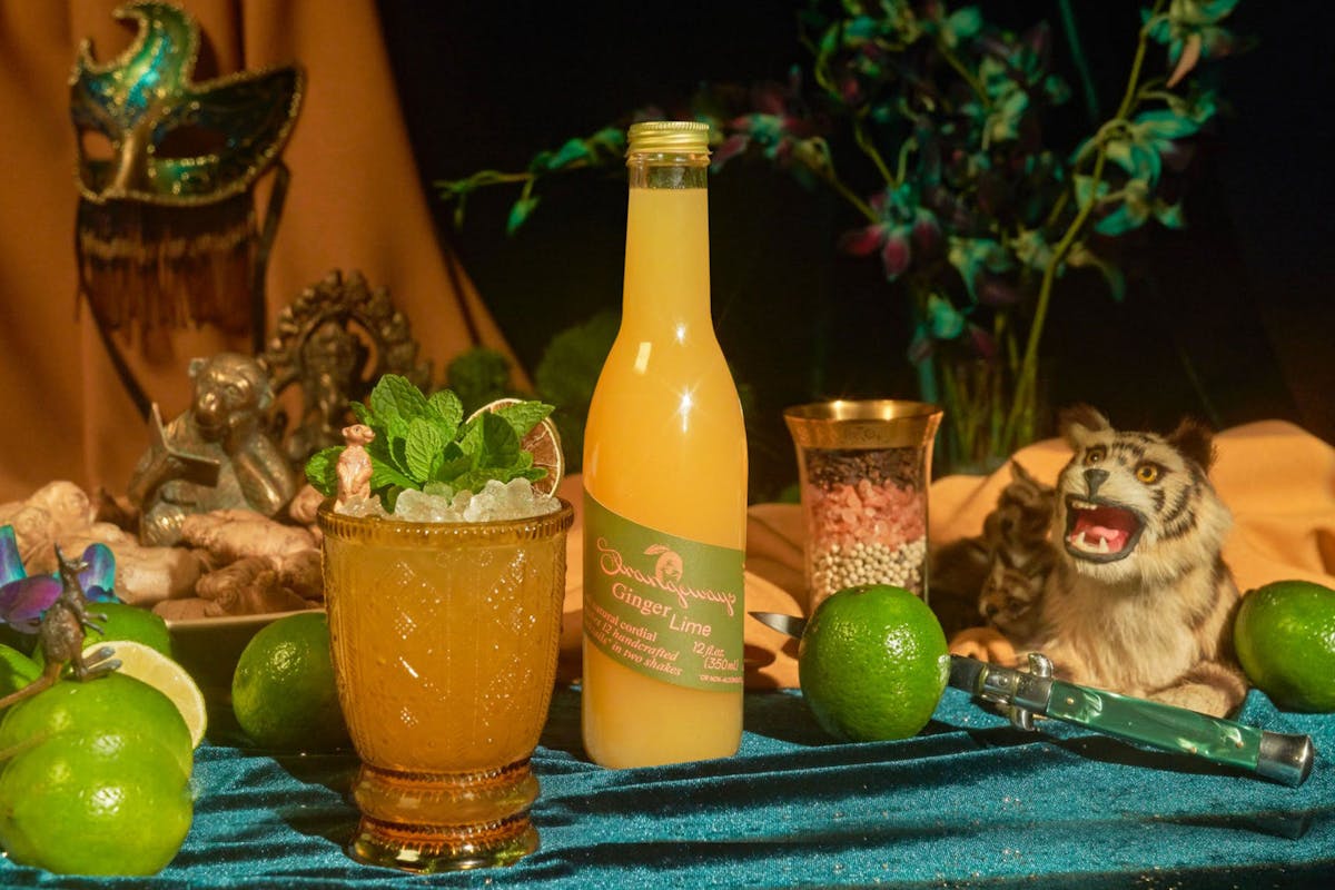 a green bottle on a table