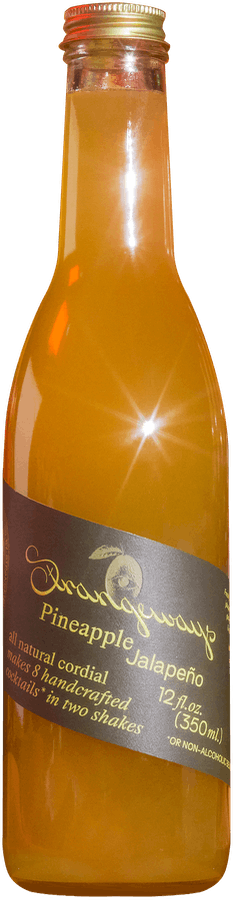 a bottle and a glass of orange juice