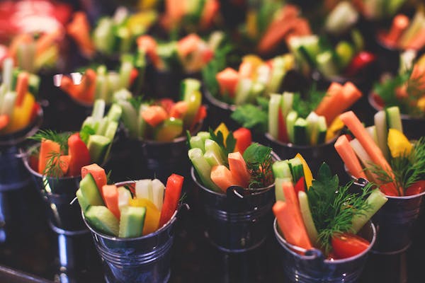 a bowl of fruit and vegetable salad
