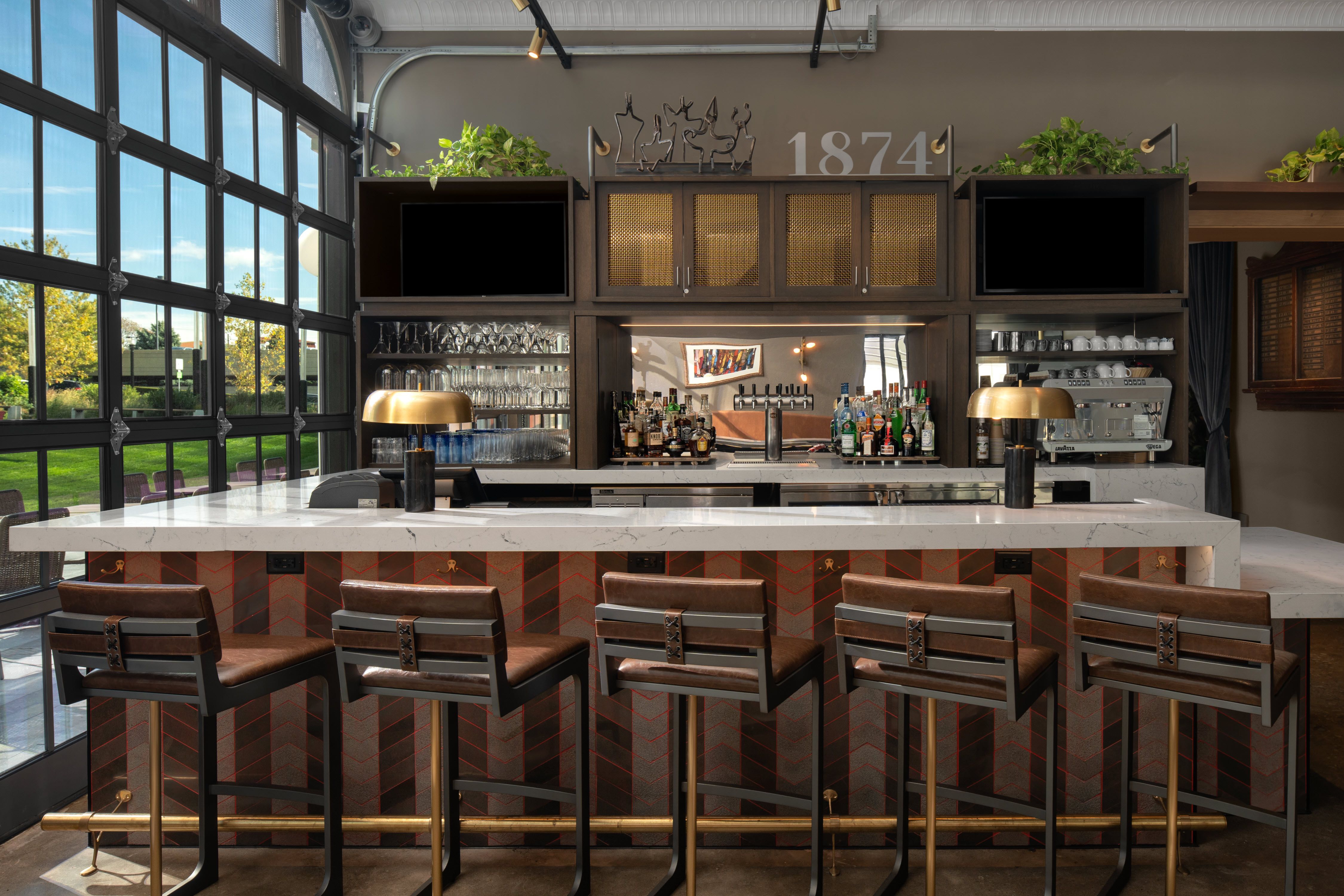 a dining room table in front of a window