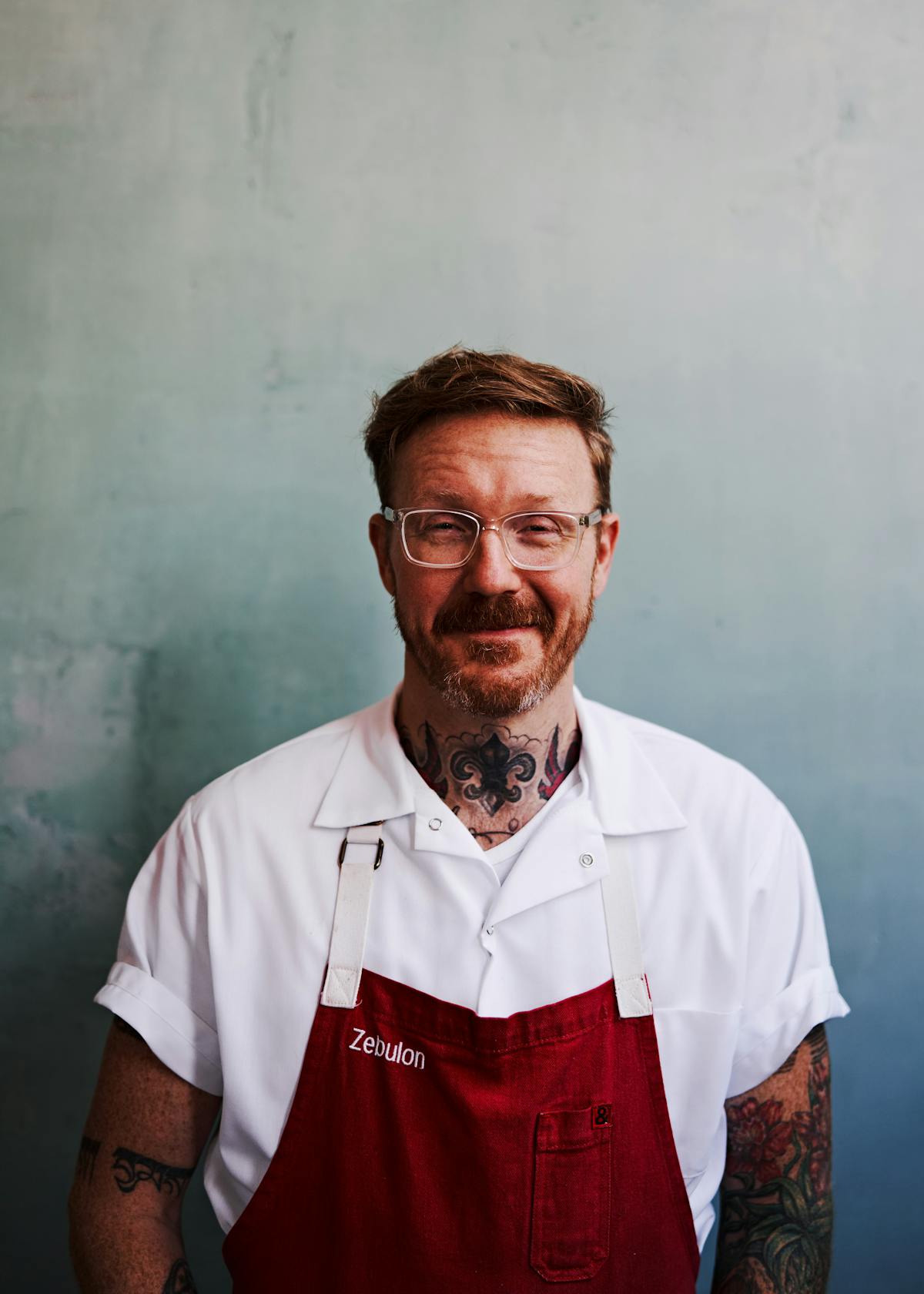 Zeb Stevenson wearing a white shirt