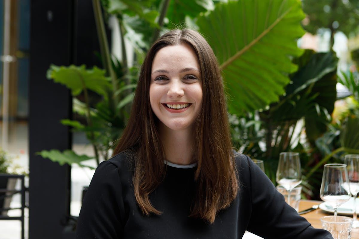 a woman smiling for the camera