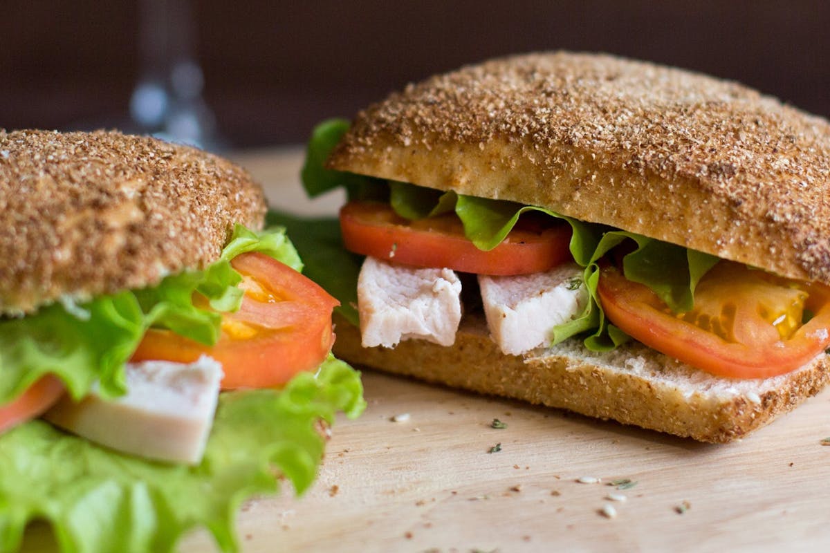 a chicken sandwich cut in half