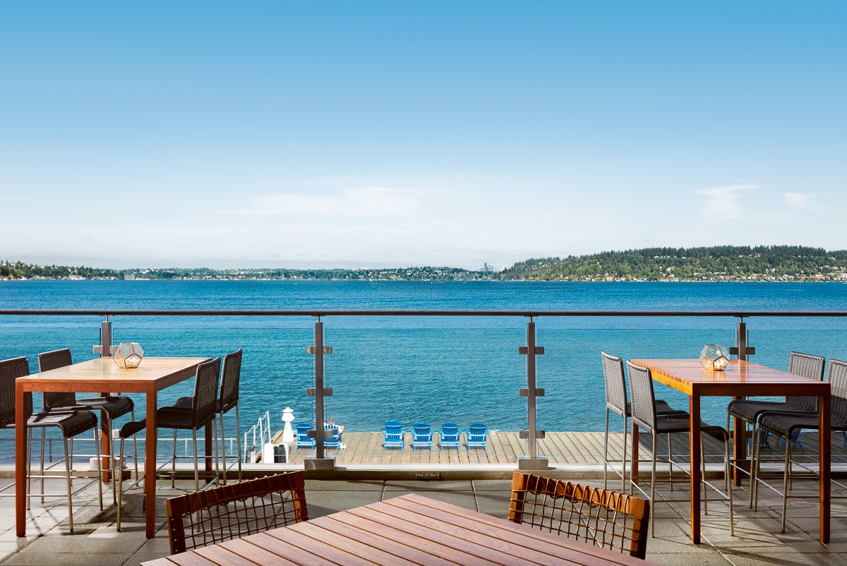 a wooden pier next to a body of water