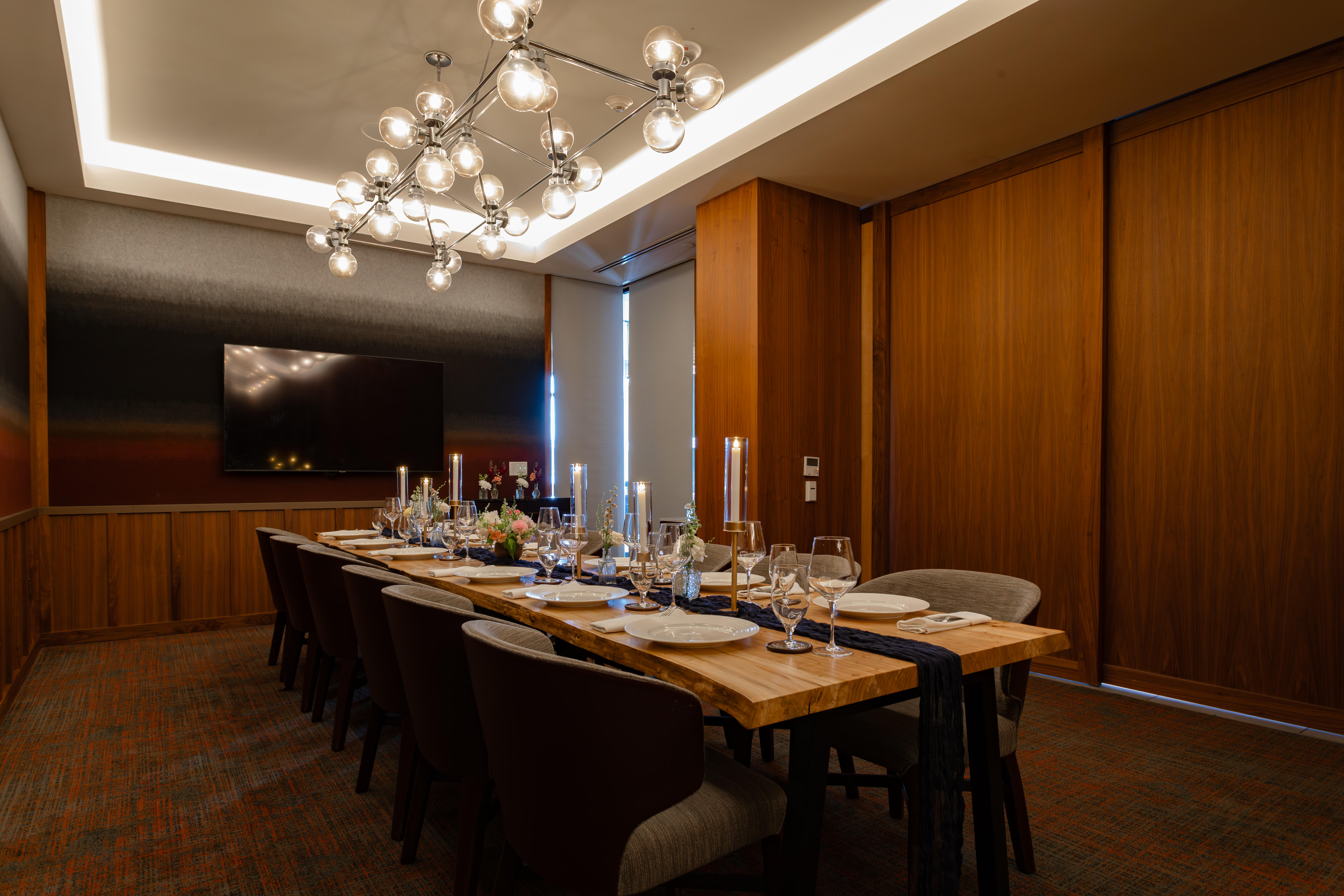 Private dining table in enclosed space. Table set.