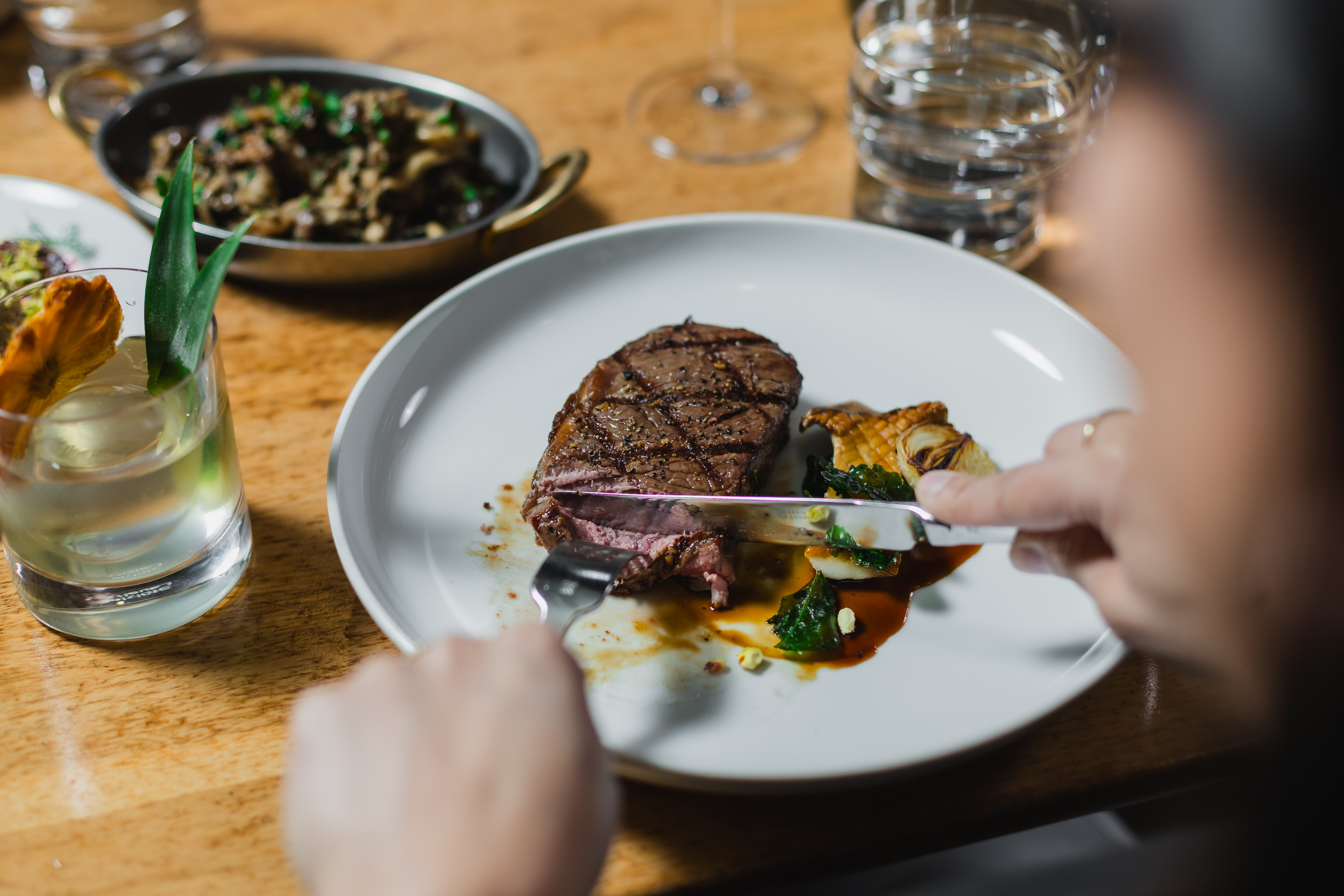 Steak and surrounding dishes