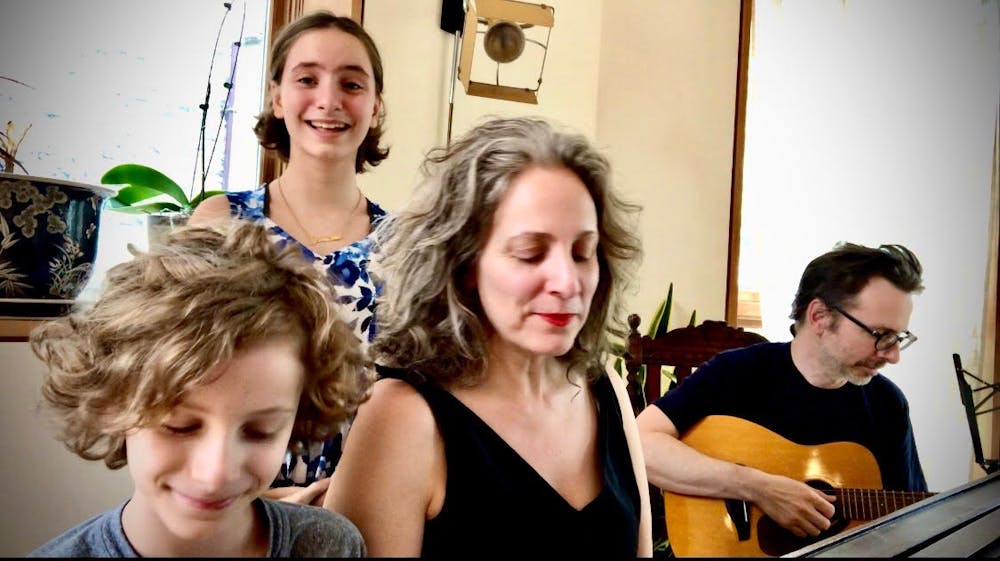 a group of people looking at the camera