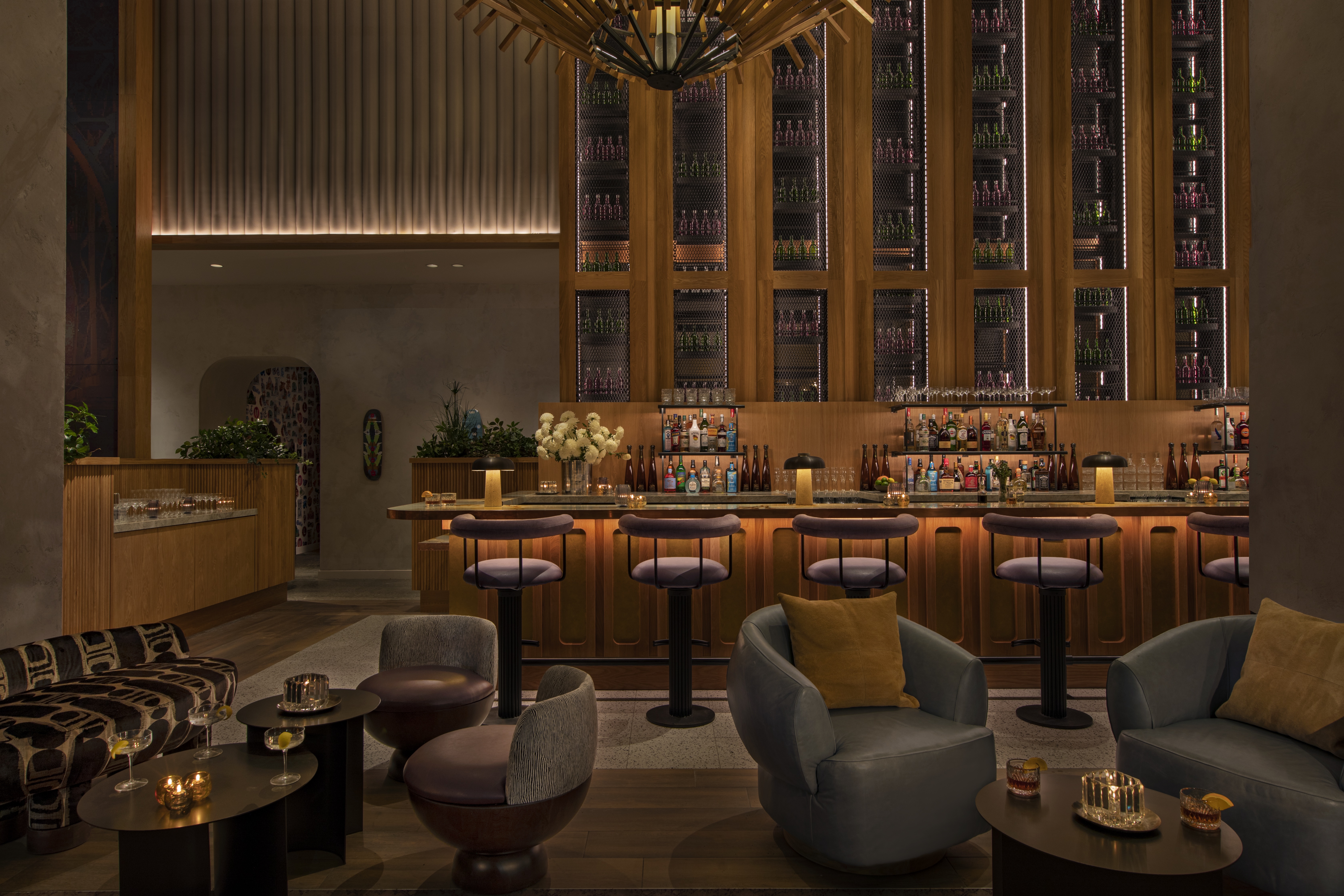 a room filled with furniture and vase on a table