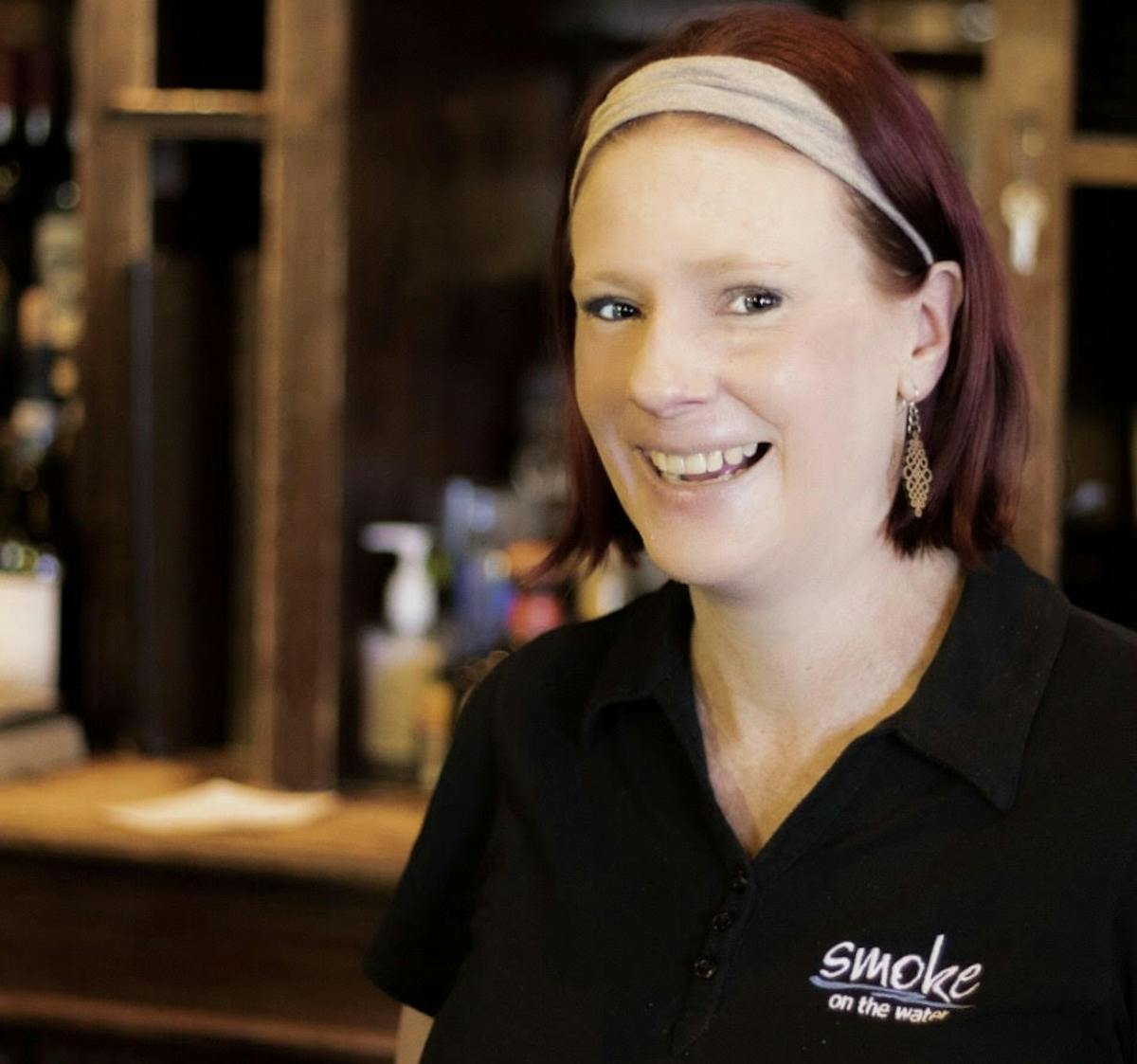 a woman smiling for the camera