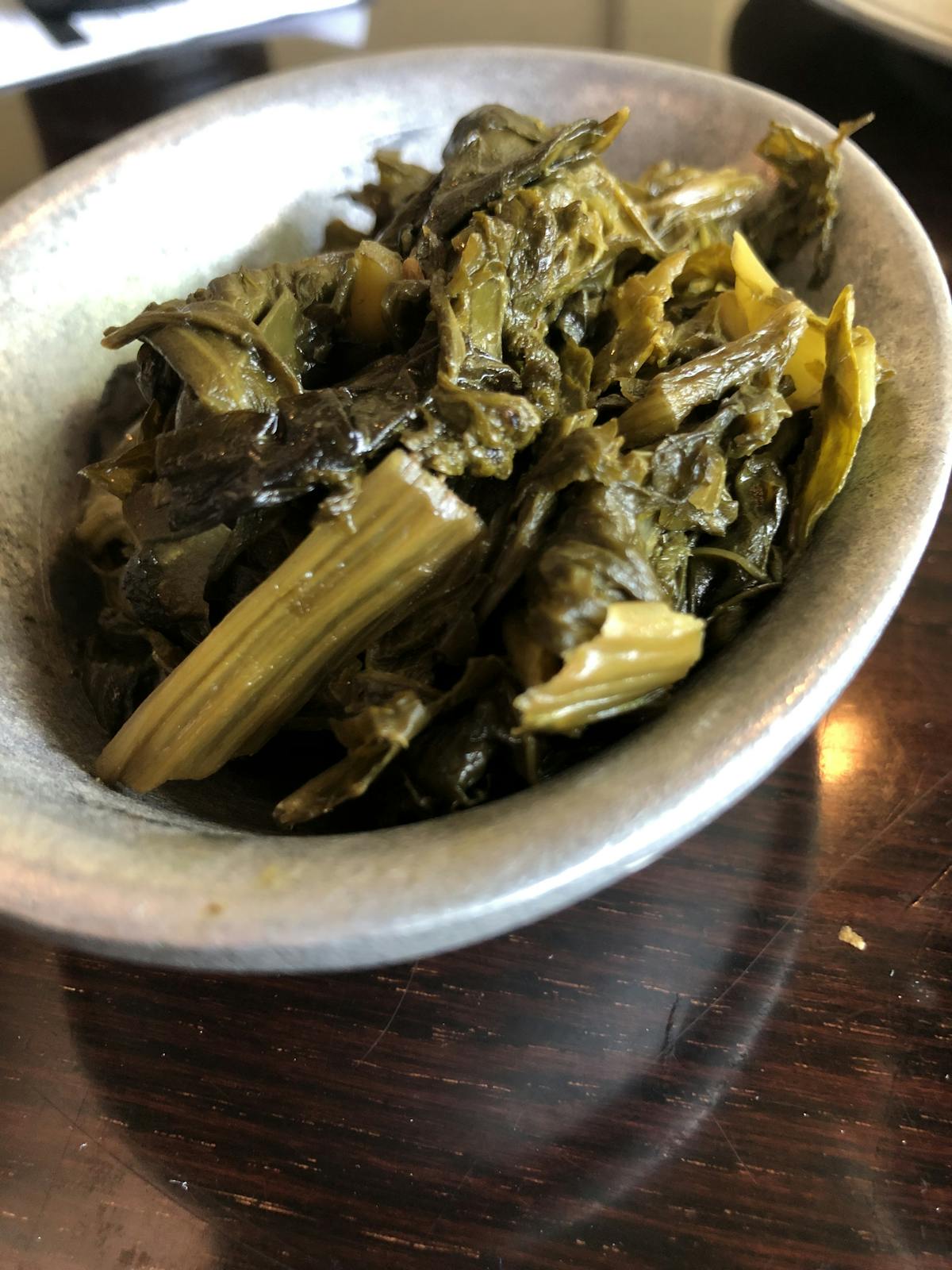 a bowl topped with vegetables