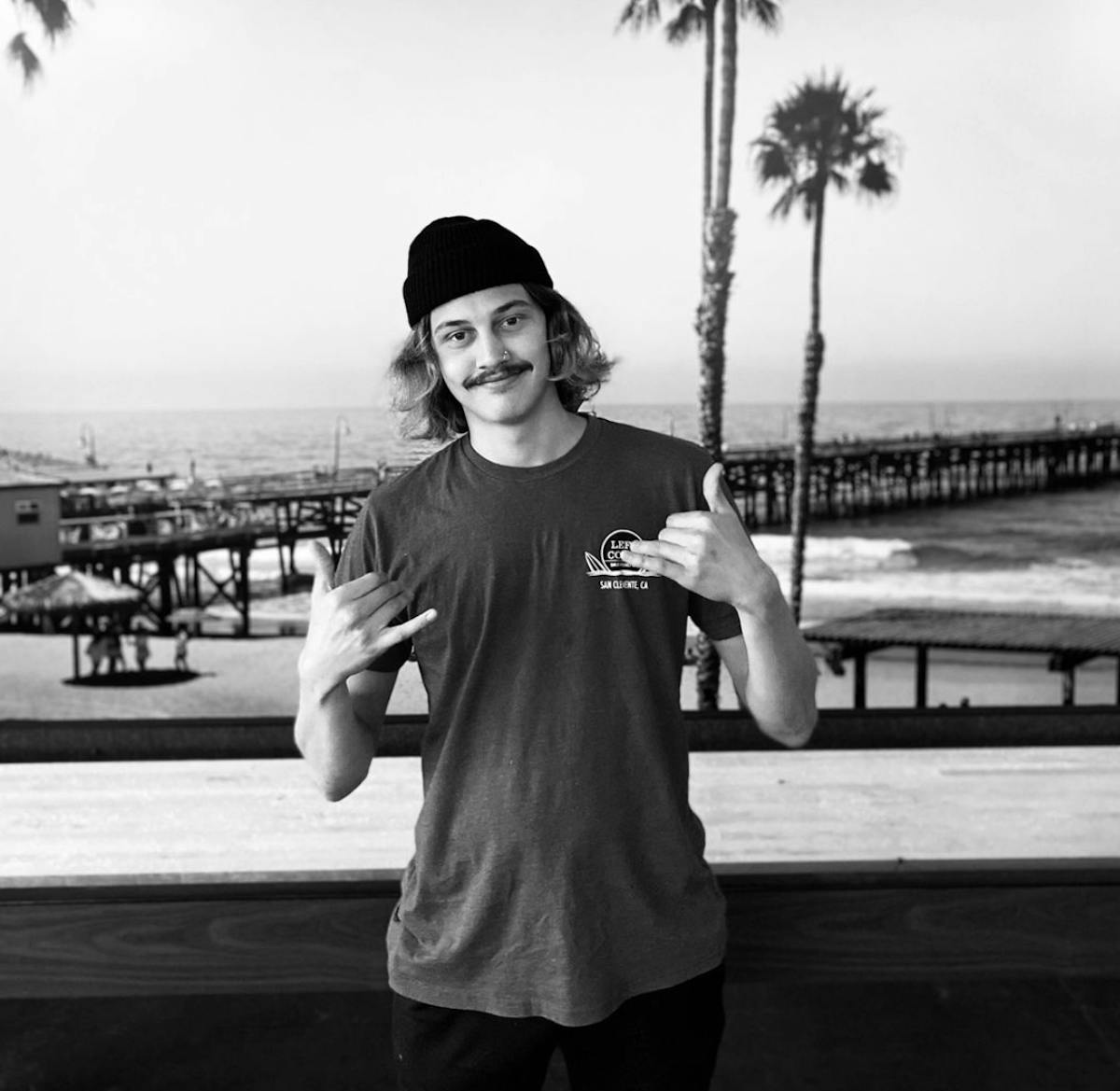 a person standing posing for the camera