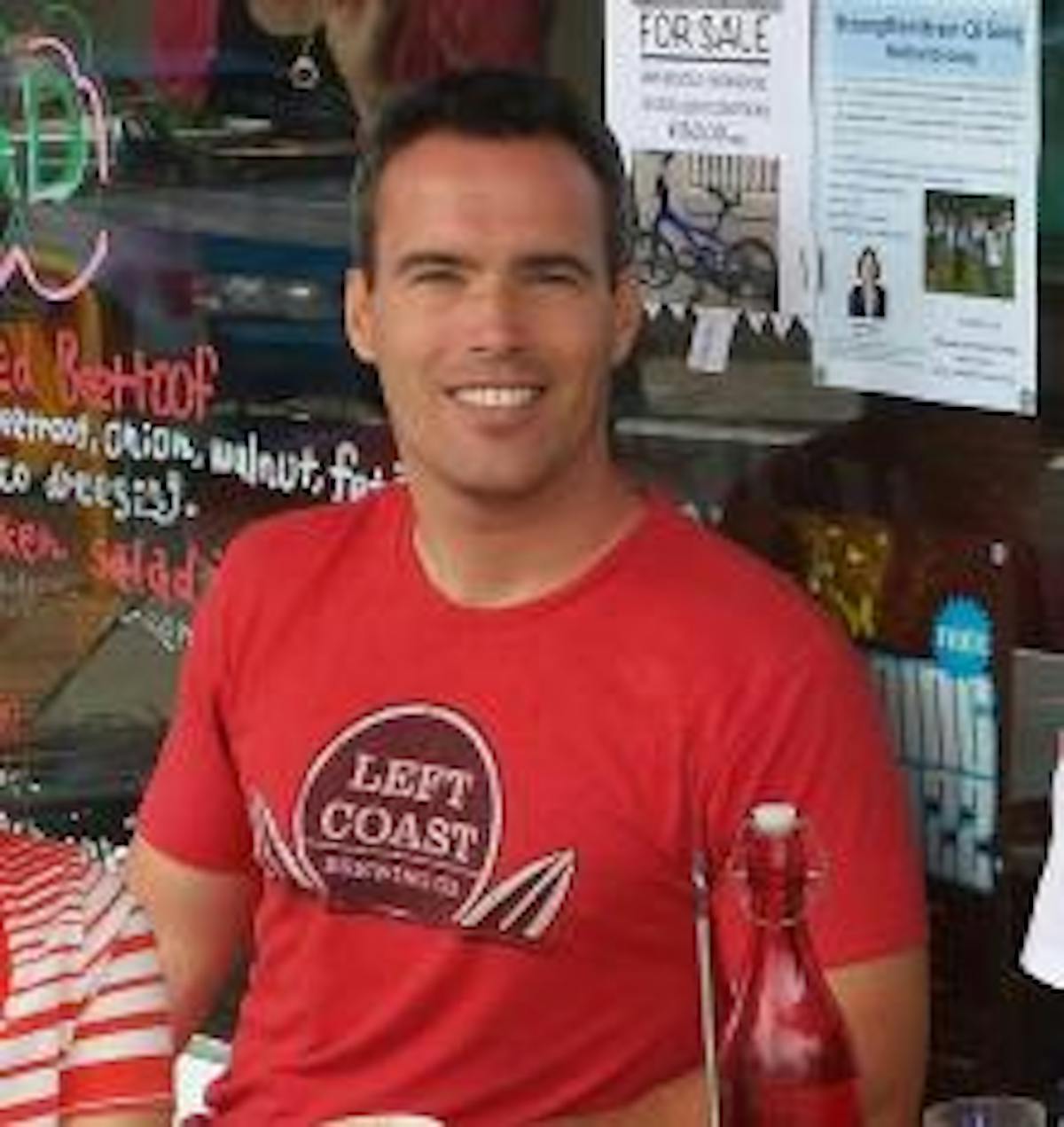 a person standing in front of a store