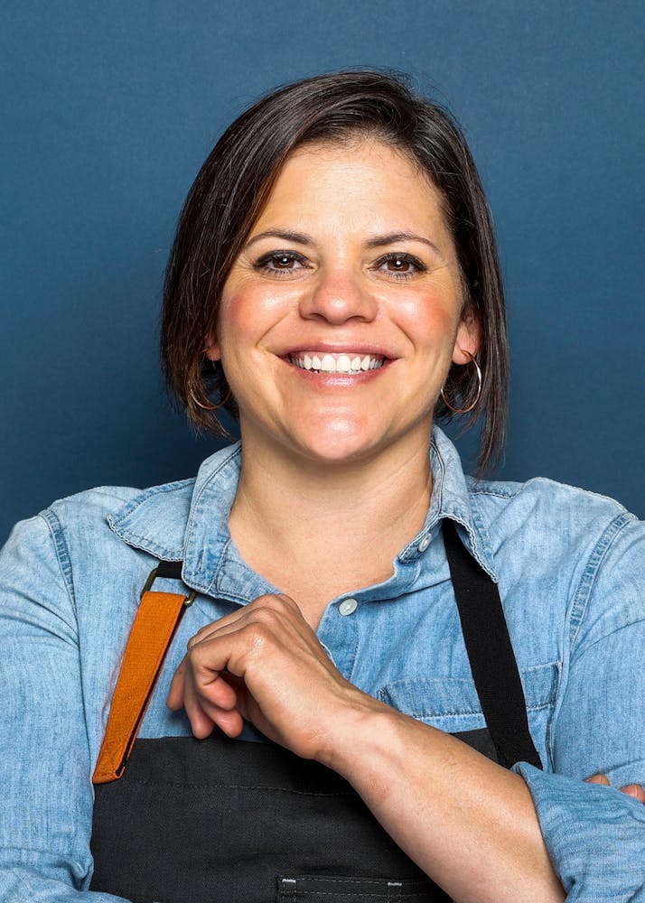 a woman smiling for the camera