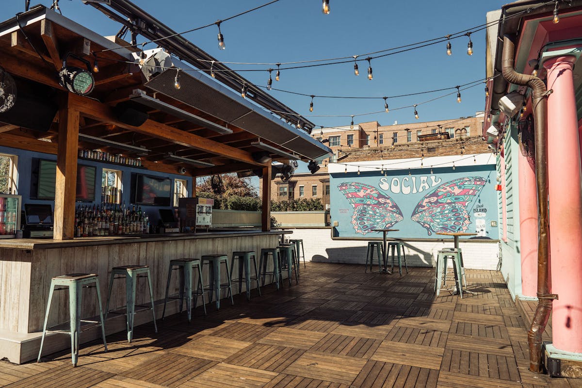 empty rooftop with chairs and butterfly