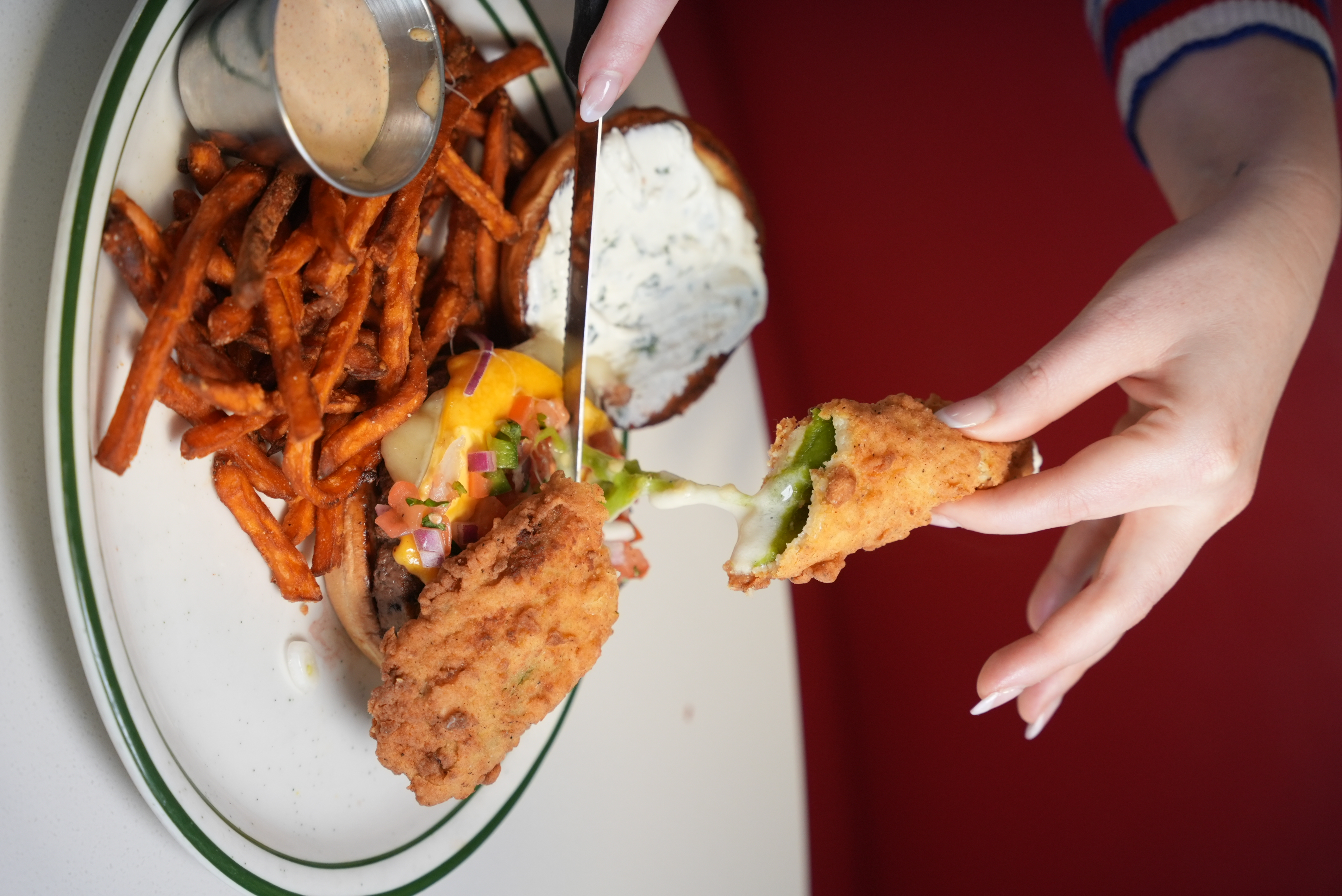 a person holding a plate of food