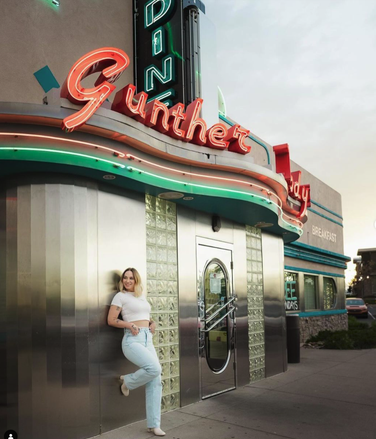 a person standing in front of a building