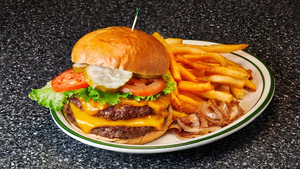 a sandwich sitting on top of a plate of food