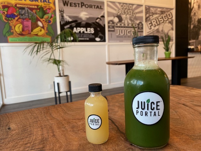 a glass bottle sitting on a table