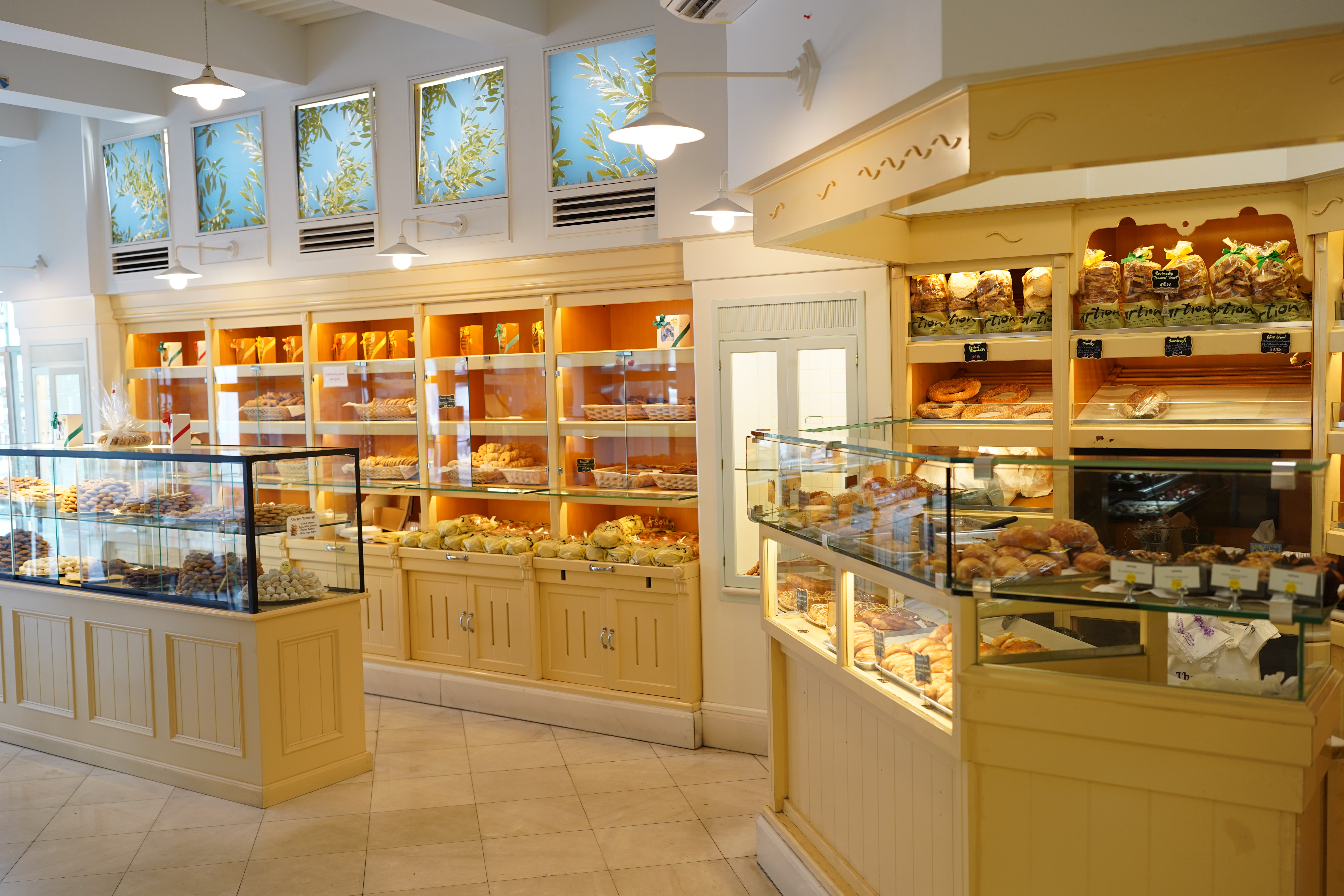 a group of people performing on a counter in a store