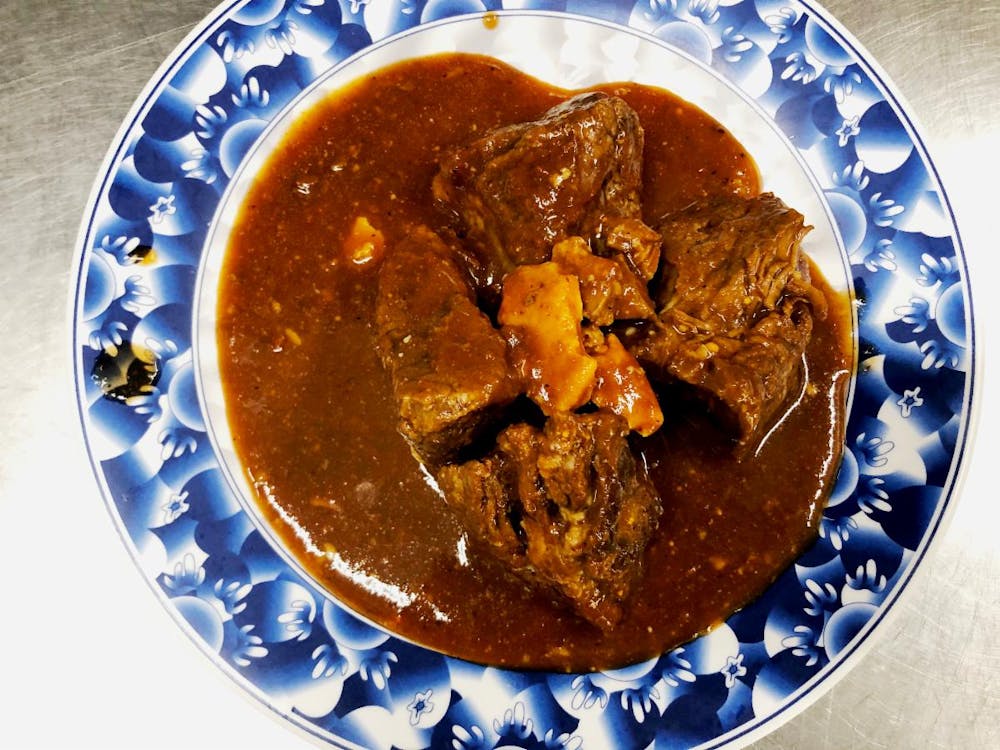 a plate of food with stew