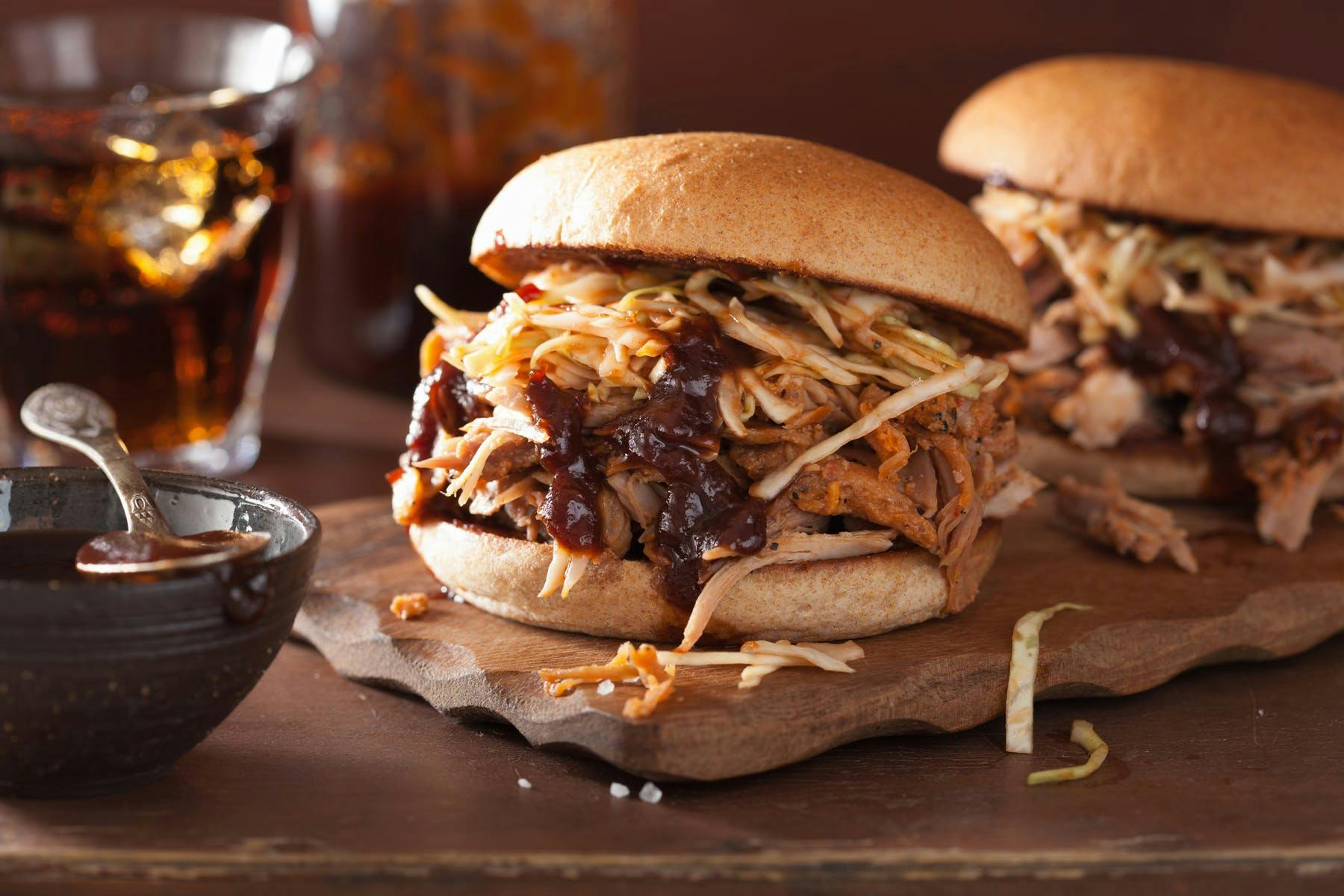 a sandwich sitting on top of a wooden table