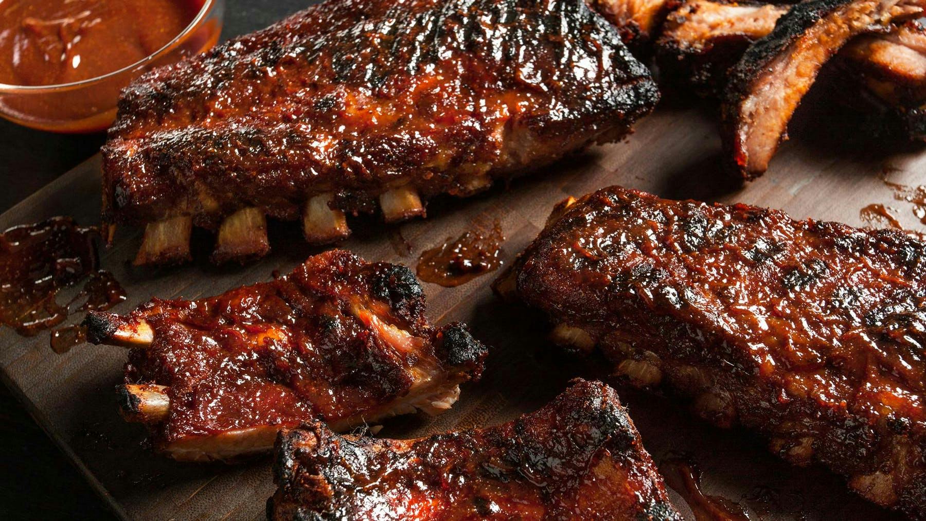 a close up of grilled meat