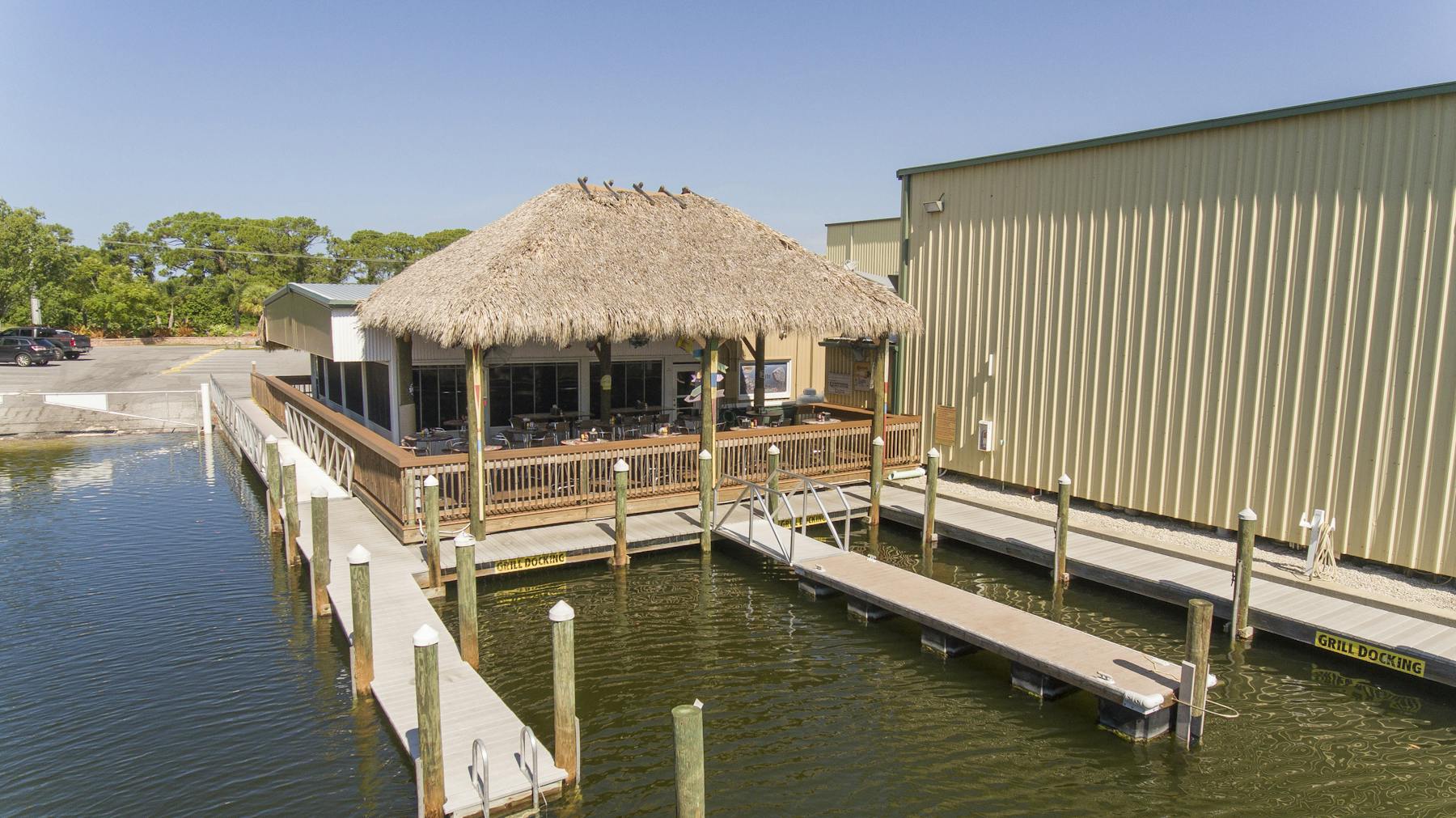 a house next to a body of water