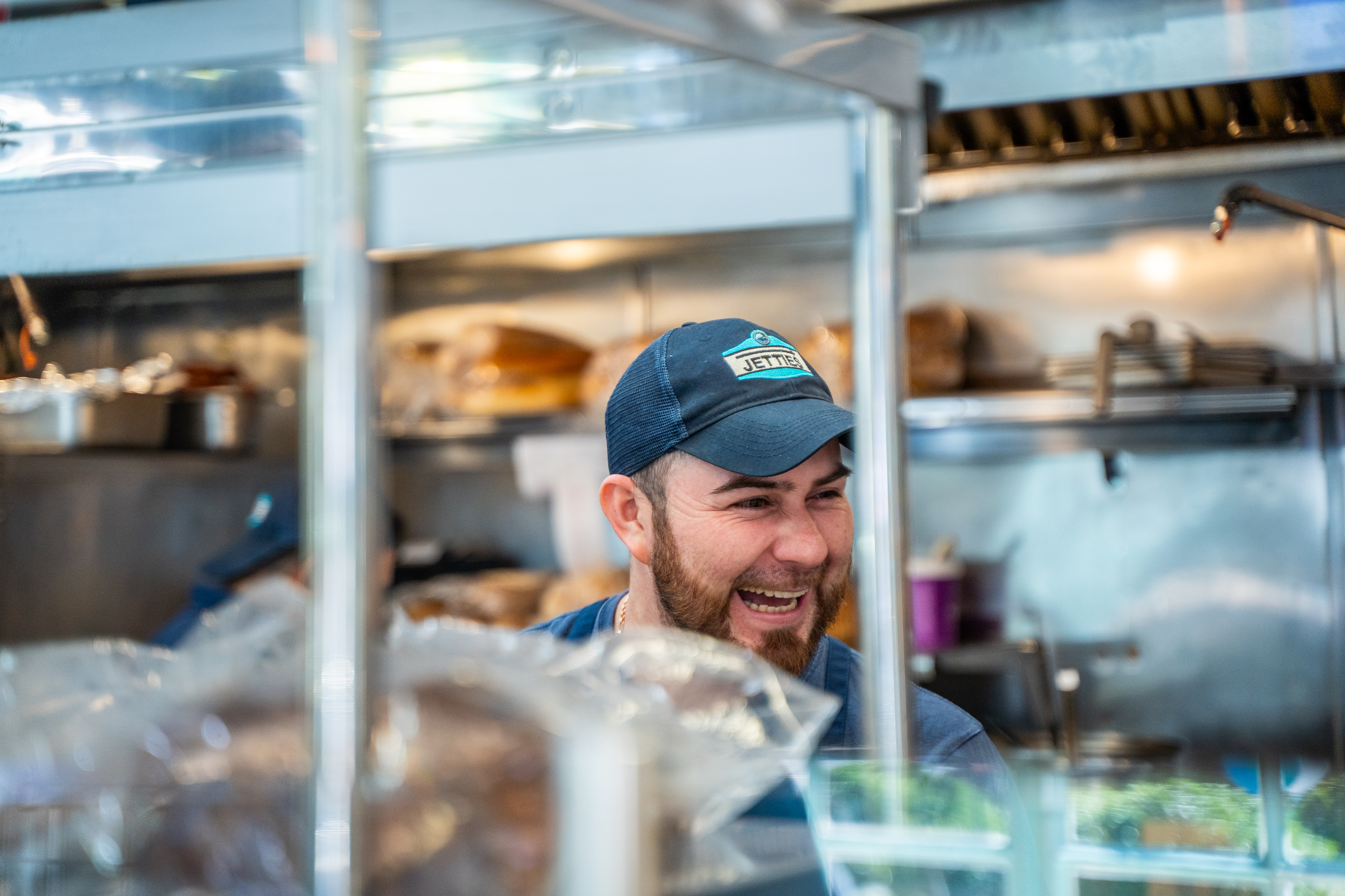 a man wearing a blue cap