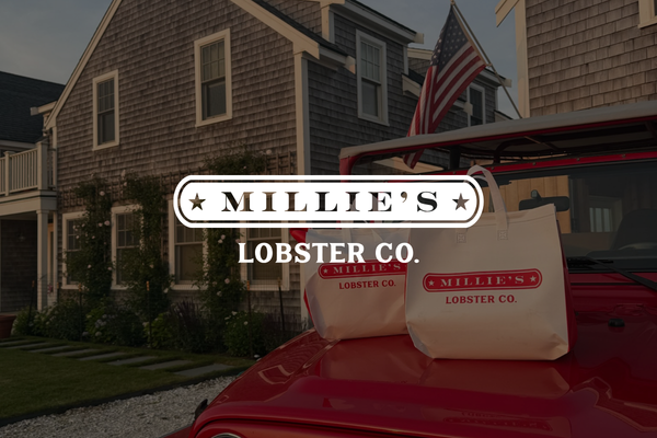 a car parked in front of a brick building