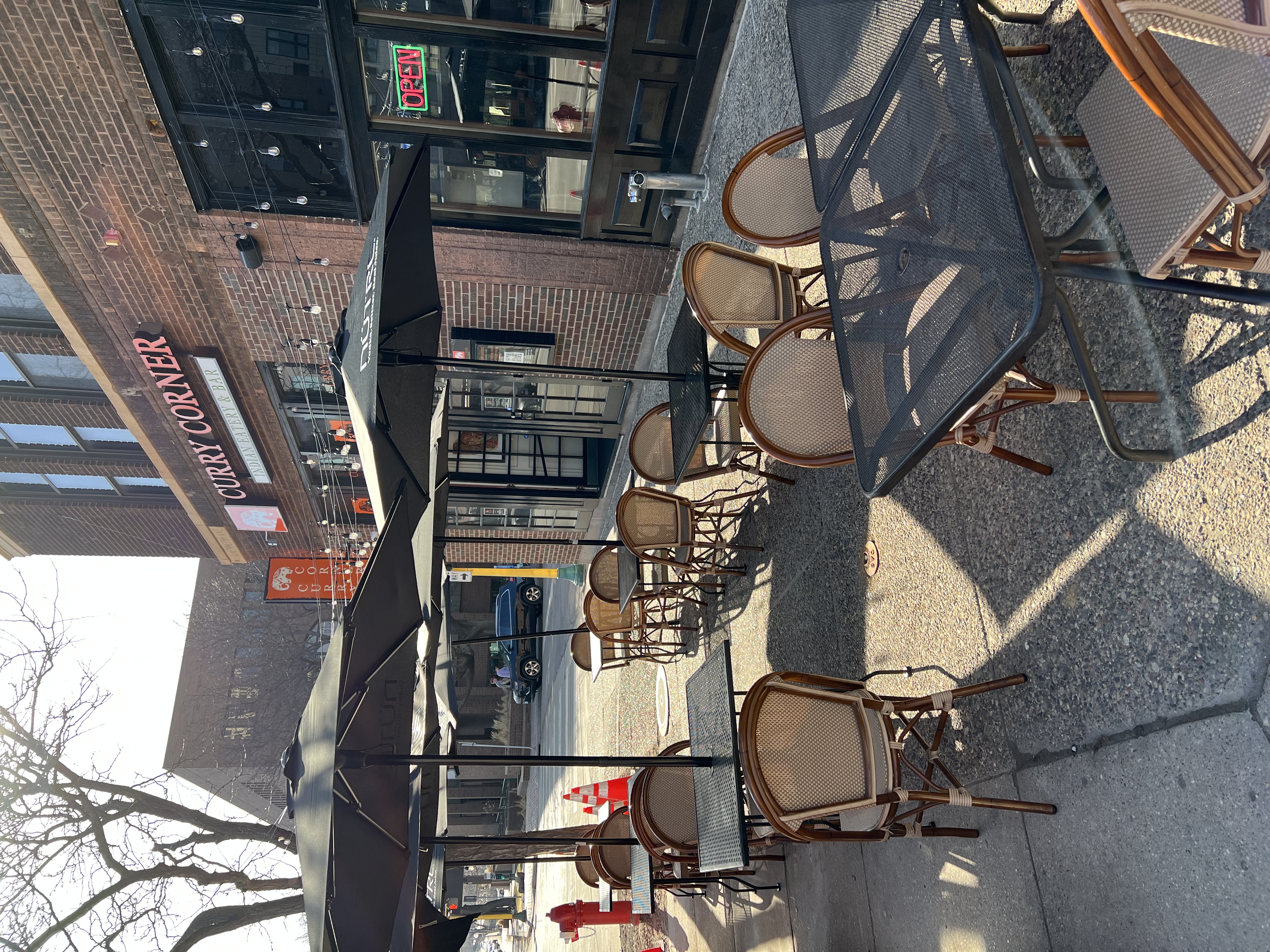 a chair sitting in front of a building