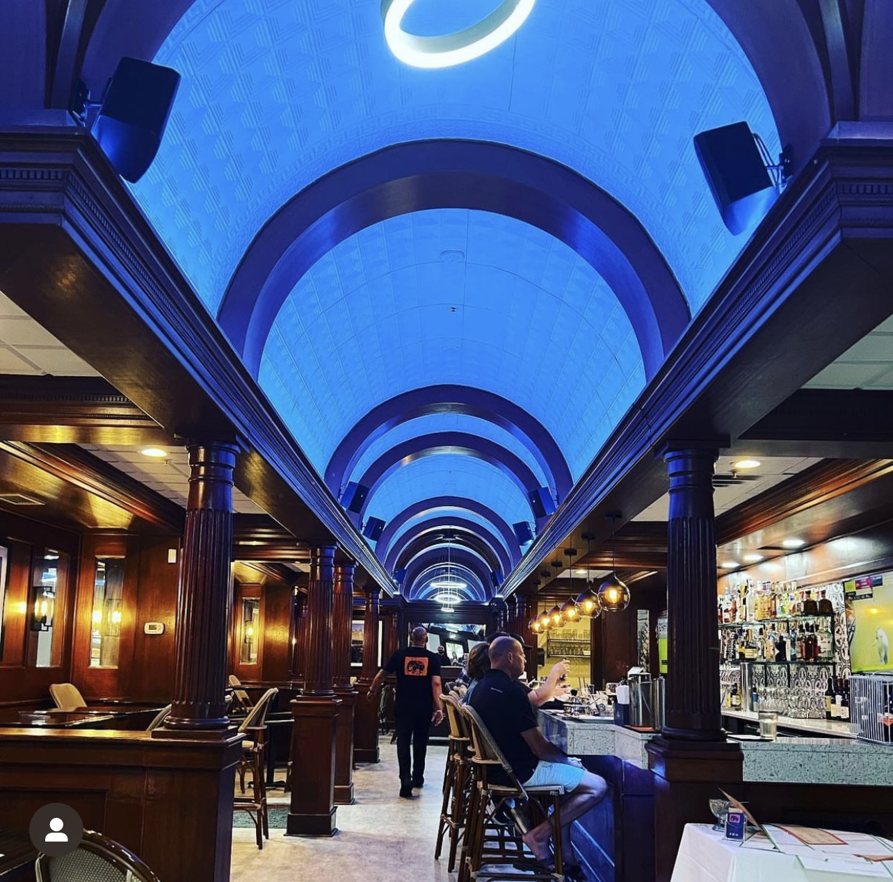 a clock on the side of Fremont Street Experience