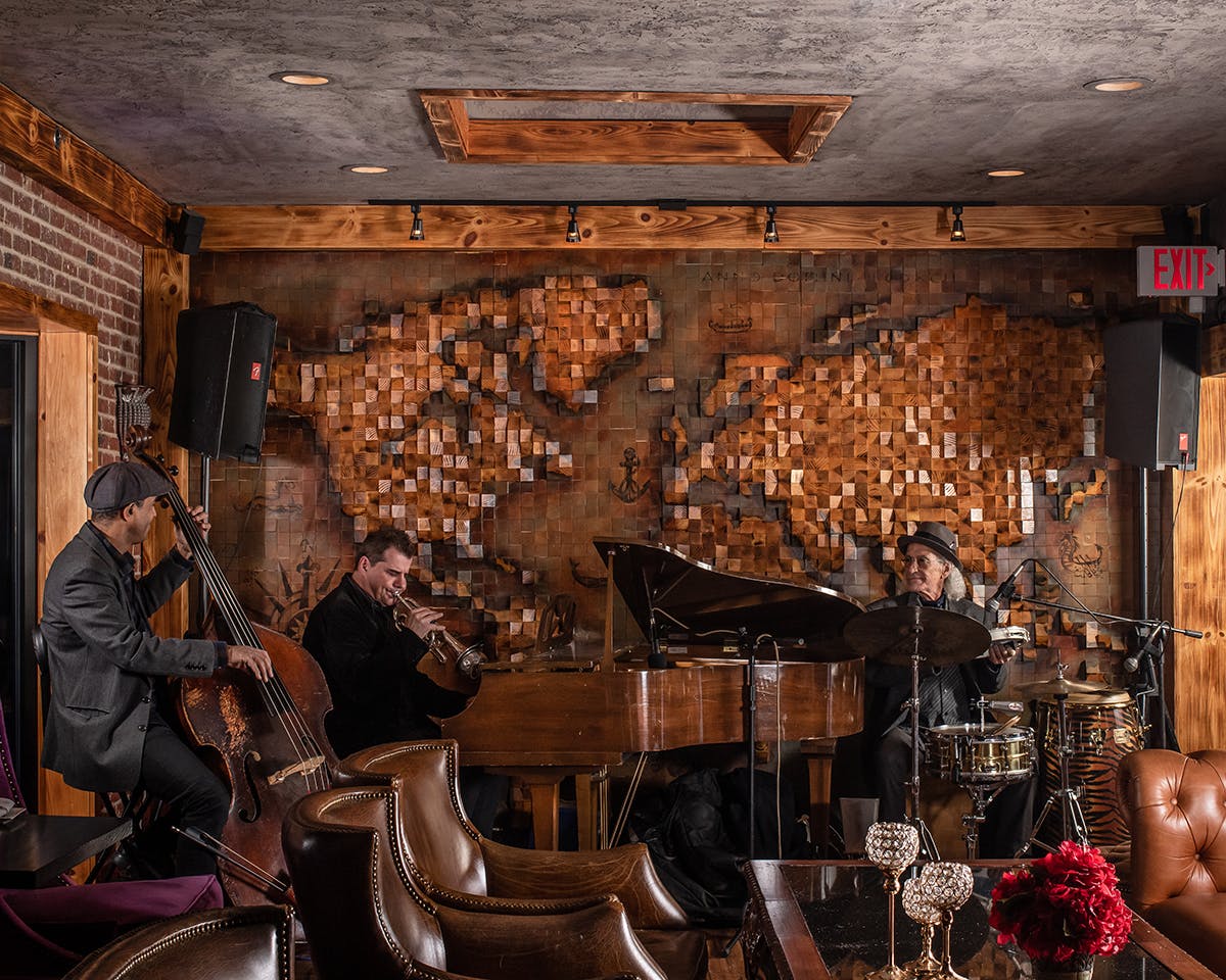 a band playing in a dining room