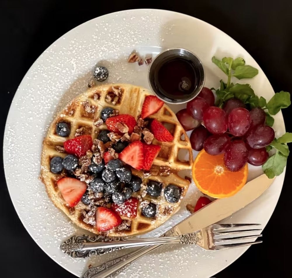 a bowl of fruit on a plate