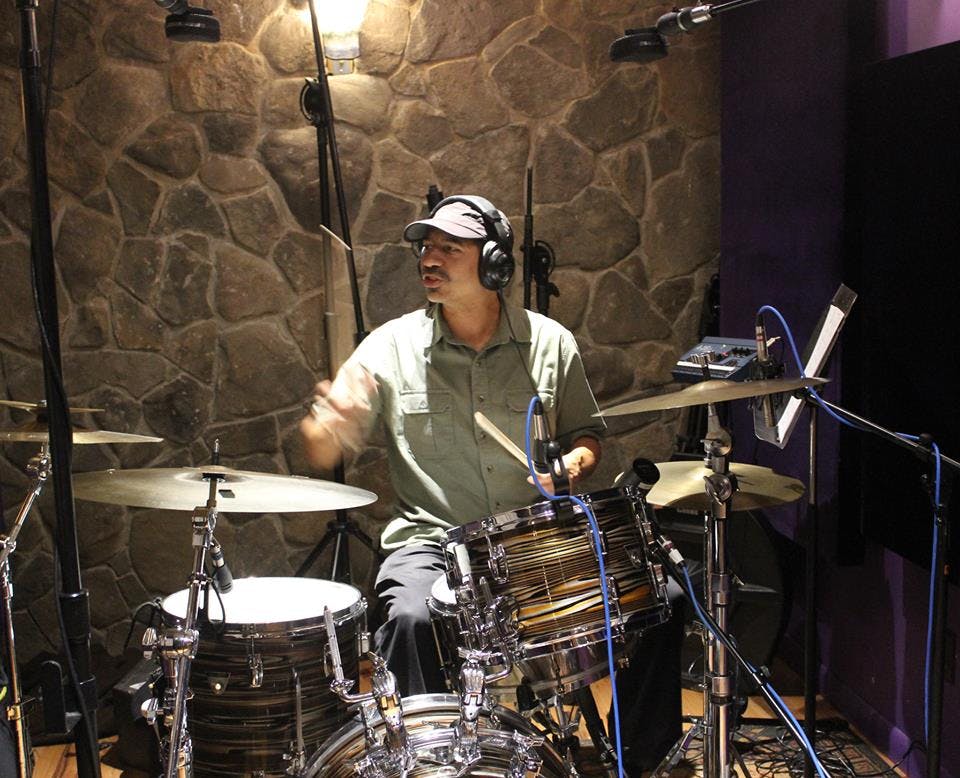 a man holding a bicycle