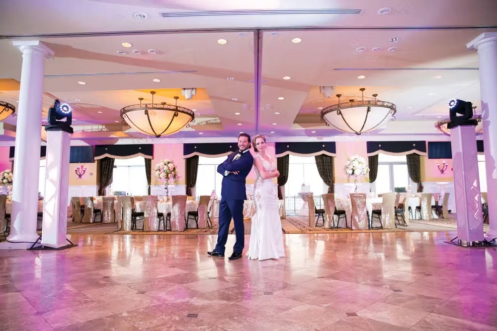 a group of people standing in a room