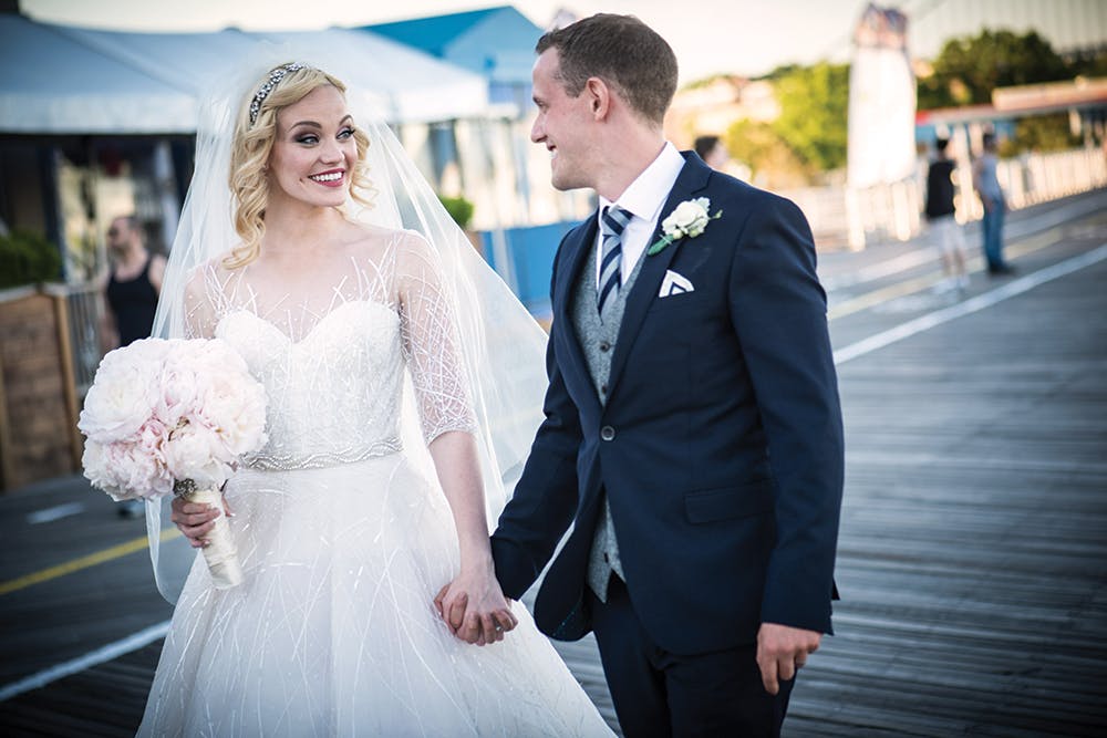 a man and a woman in a wedding dress